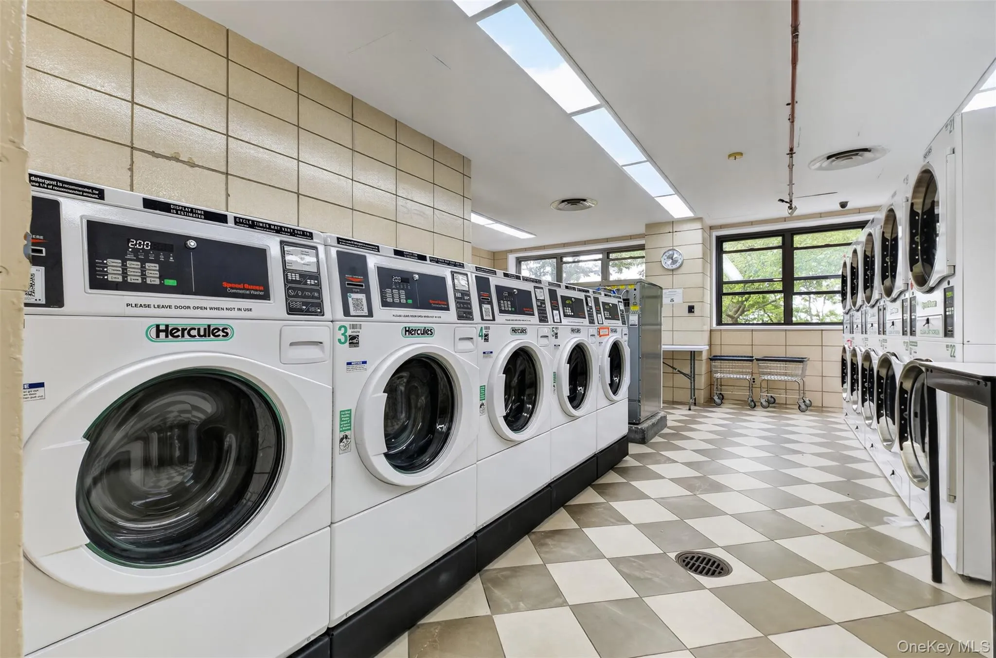 On-site laundry room with multiple machines for convenience On-site laundry room with multiple machines for convenience