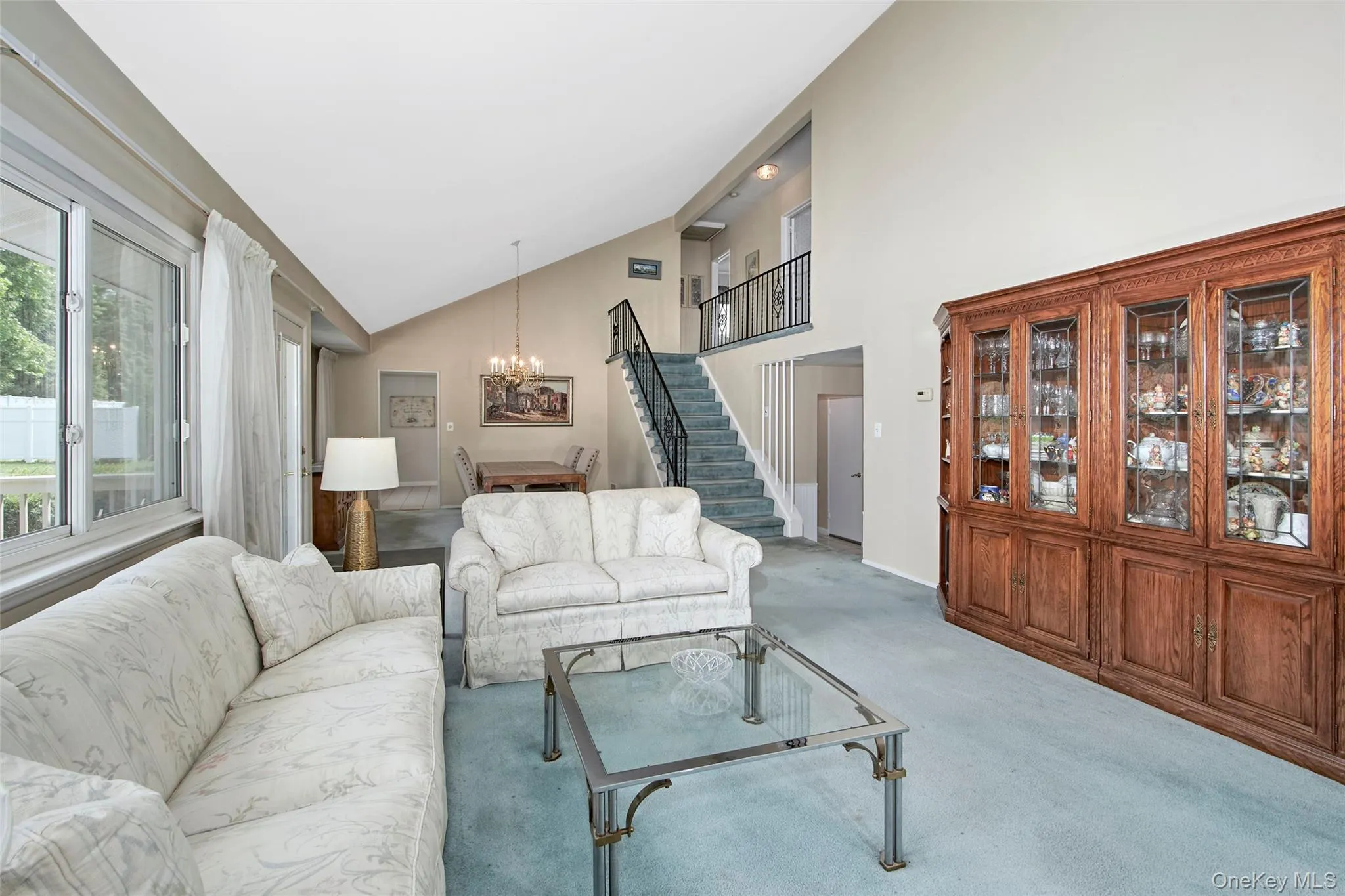 View of dining room and central staircase to bedrooms or potential office View of dining room and central staircase to bedrooms or potential office