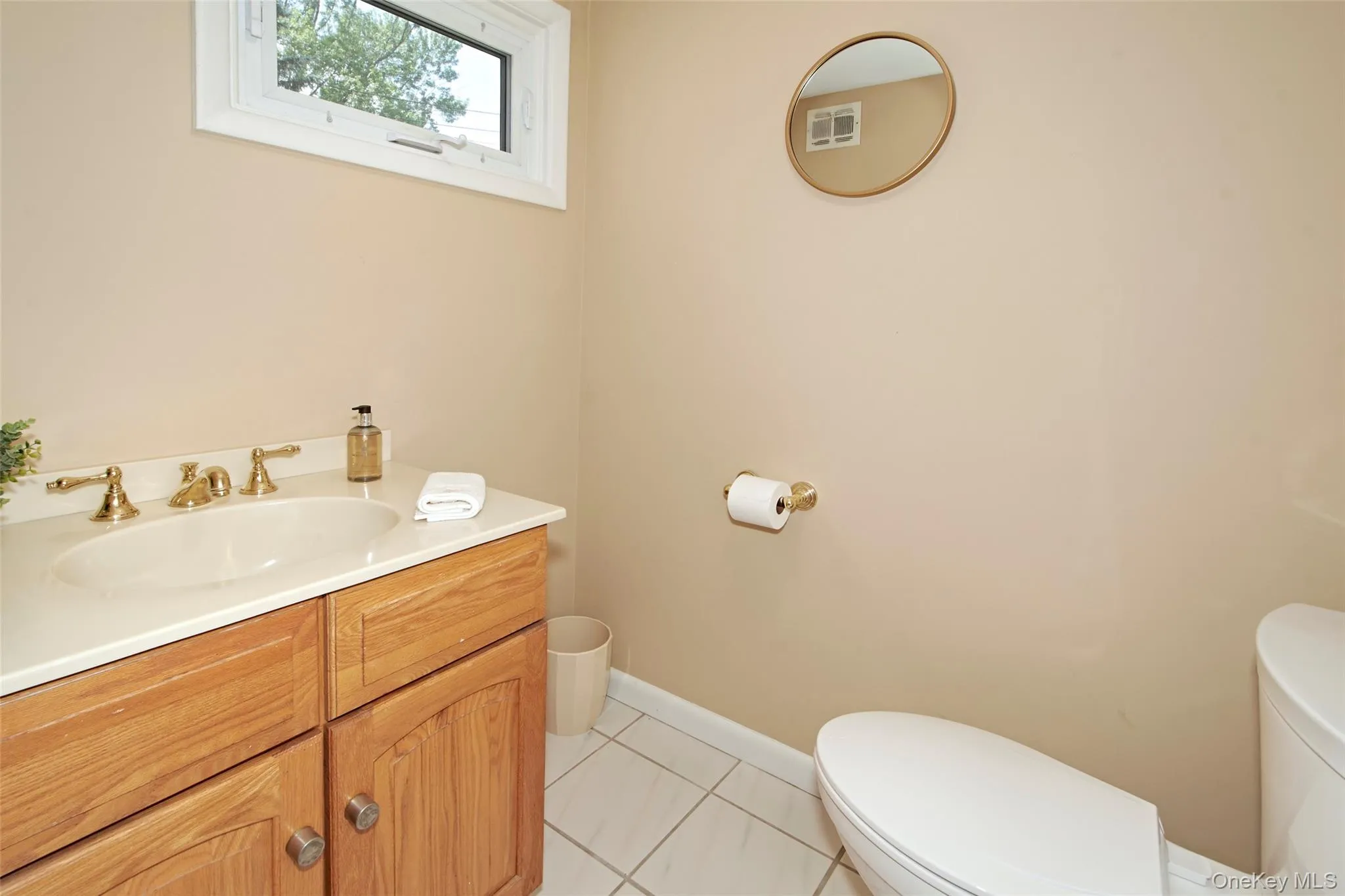 Powder room off main foyer Powder room off main foyer