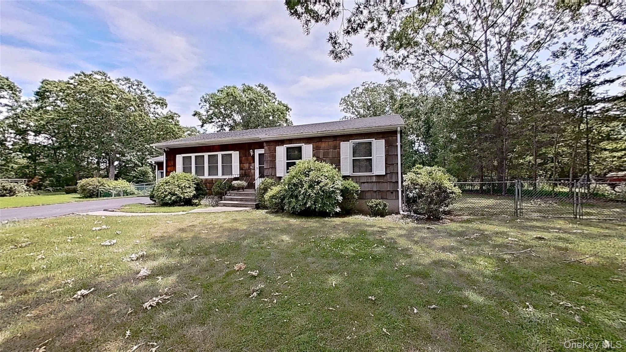 Setback off the road and featuring a fenced backyard! Setback off the road and featuring a fenced backyard!