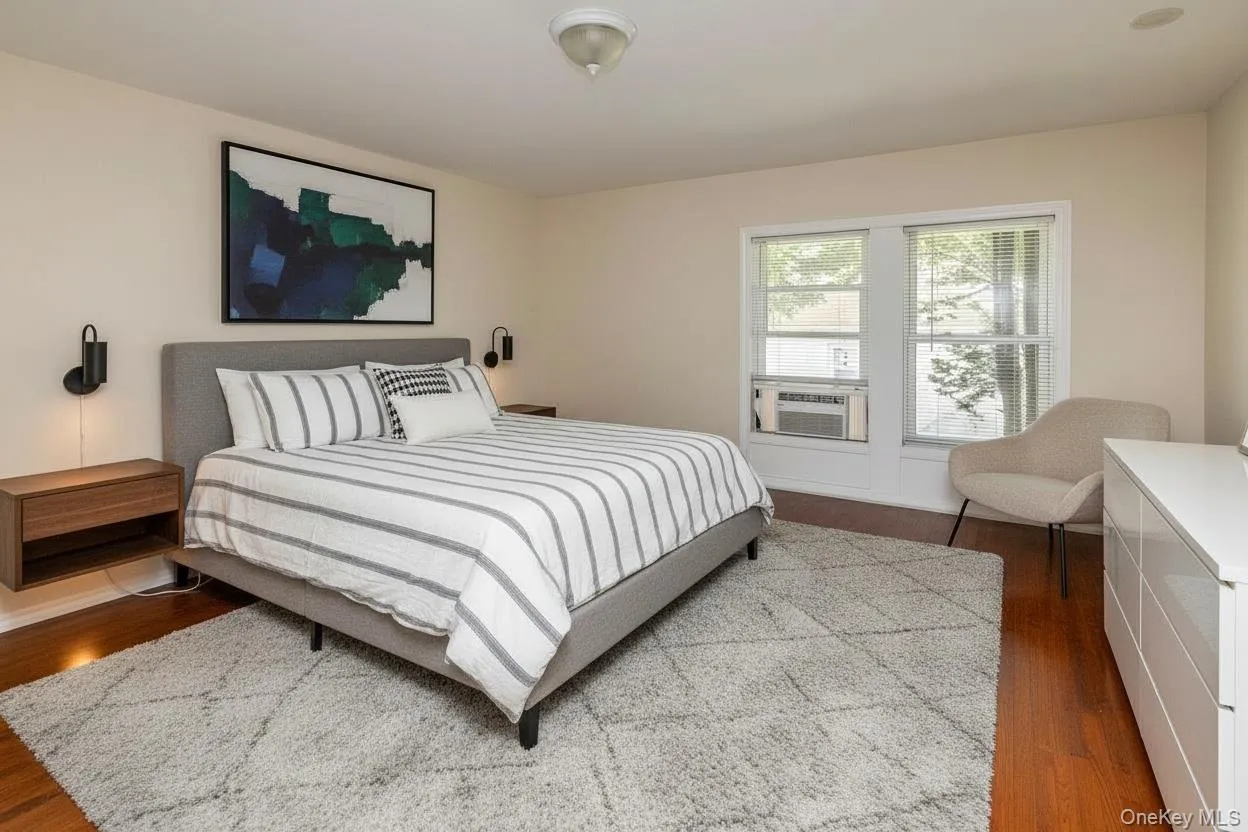 Virtually staged primary bedroom Virtually staged primary bedroom