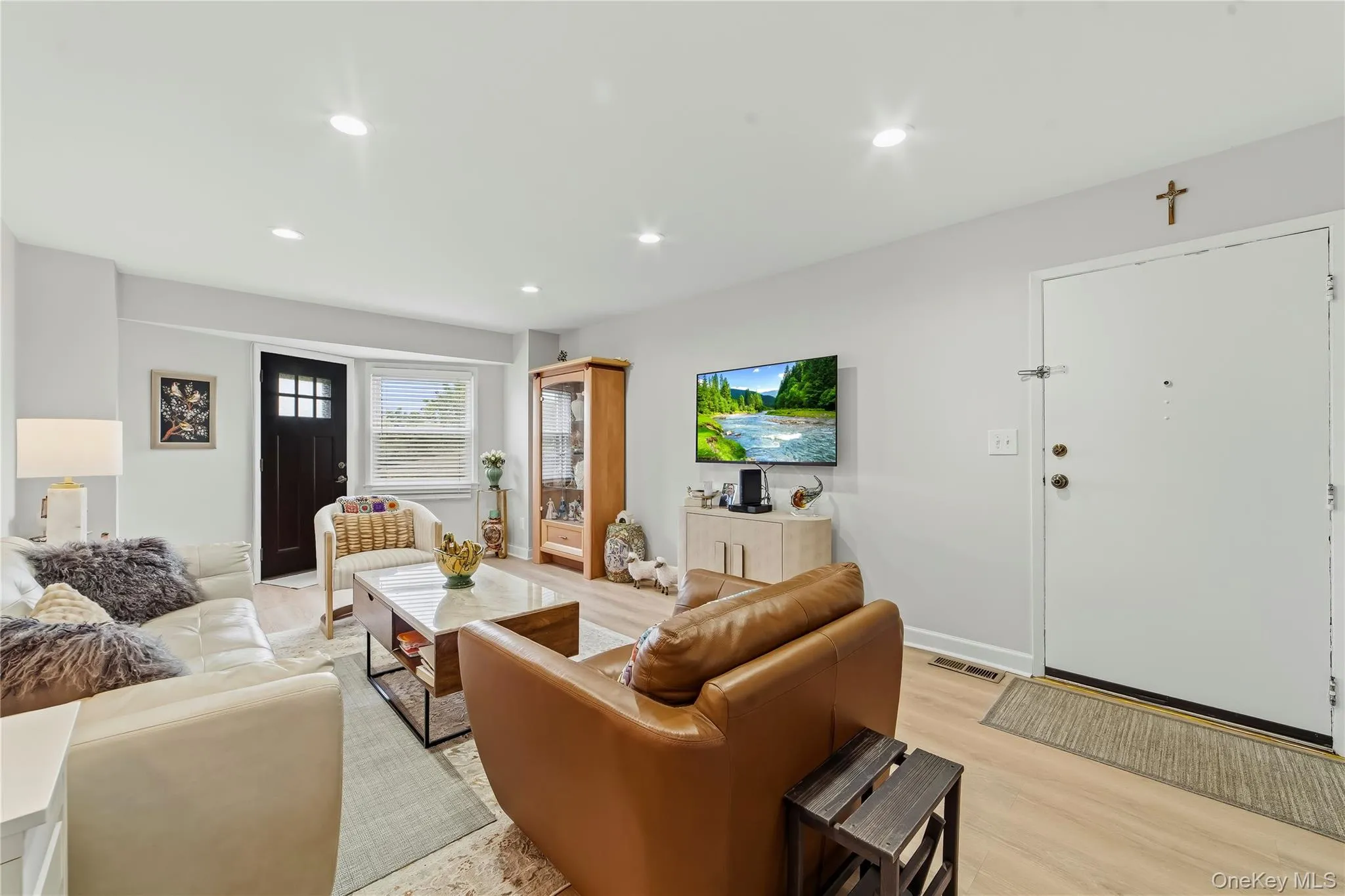 Living room with recessed lighting, and so much space. Living room with recessed lighting, and so much space.