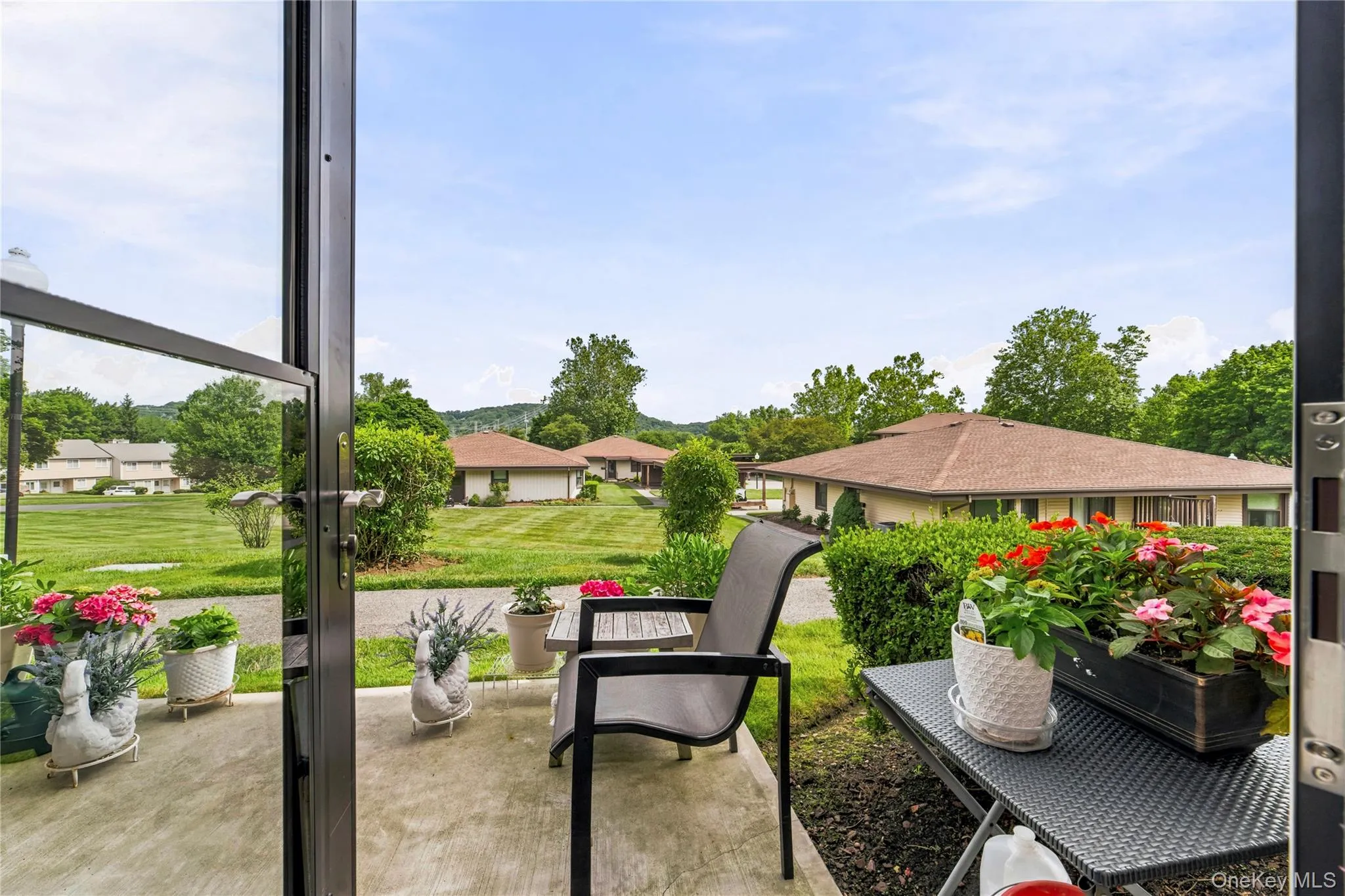Enjoy the view form your living room and patio to the outdoor lush green space. Enjoy the view form your living room and patio to the outdoor lush green space.