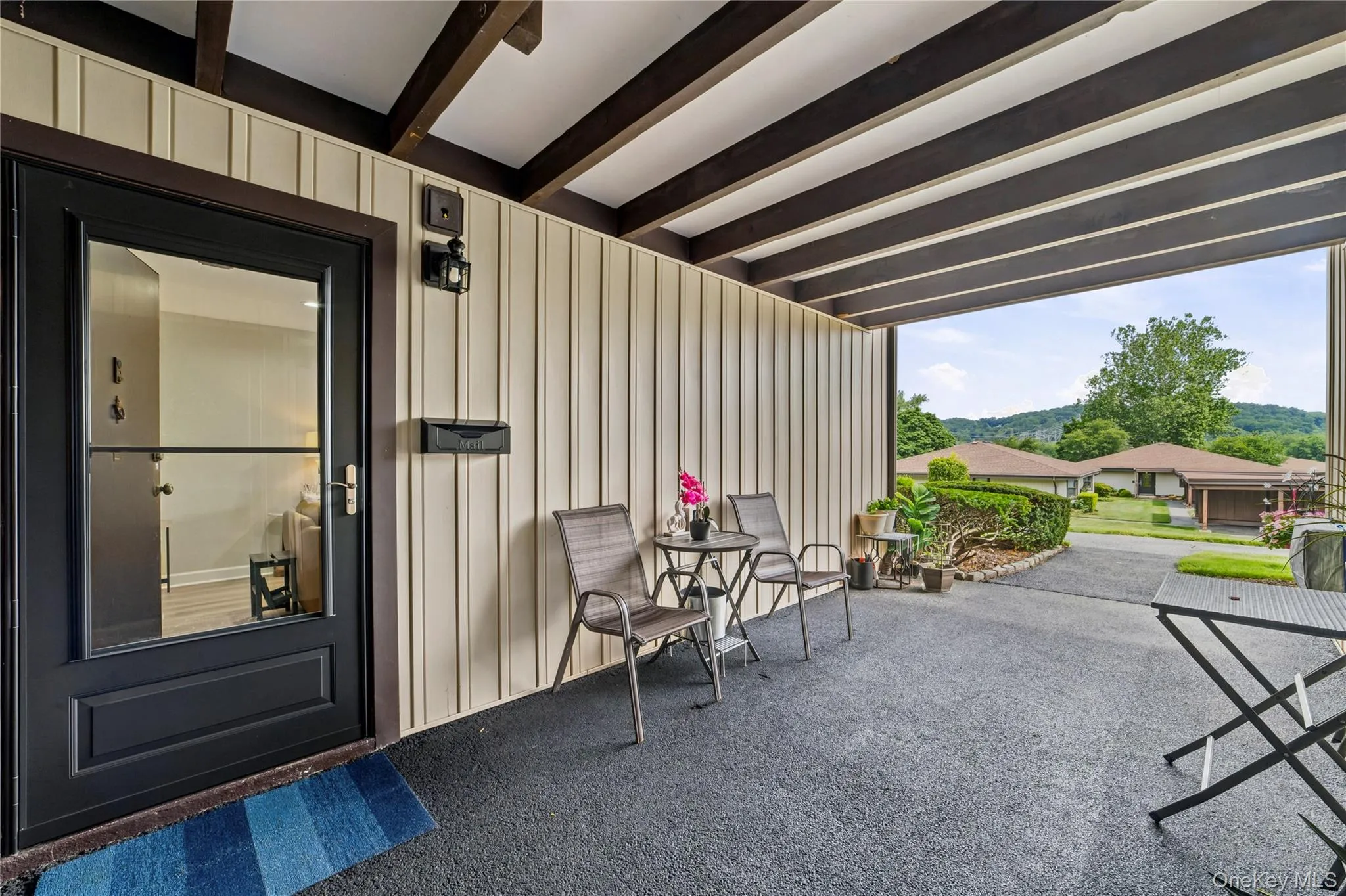 Covered entryway to your front door with space for seating. Covered entryway to your front door with space for seating.