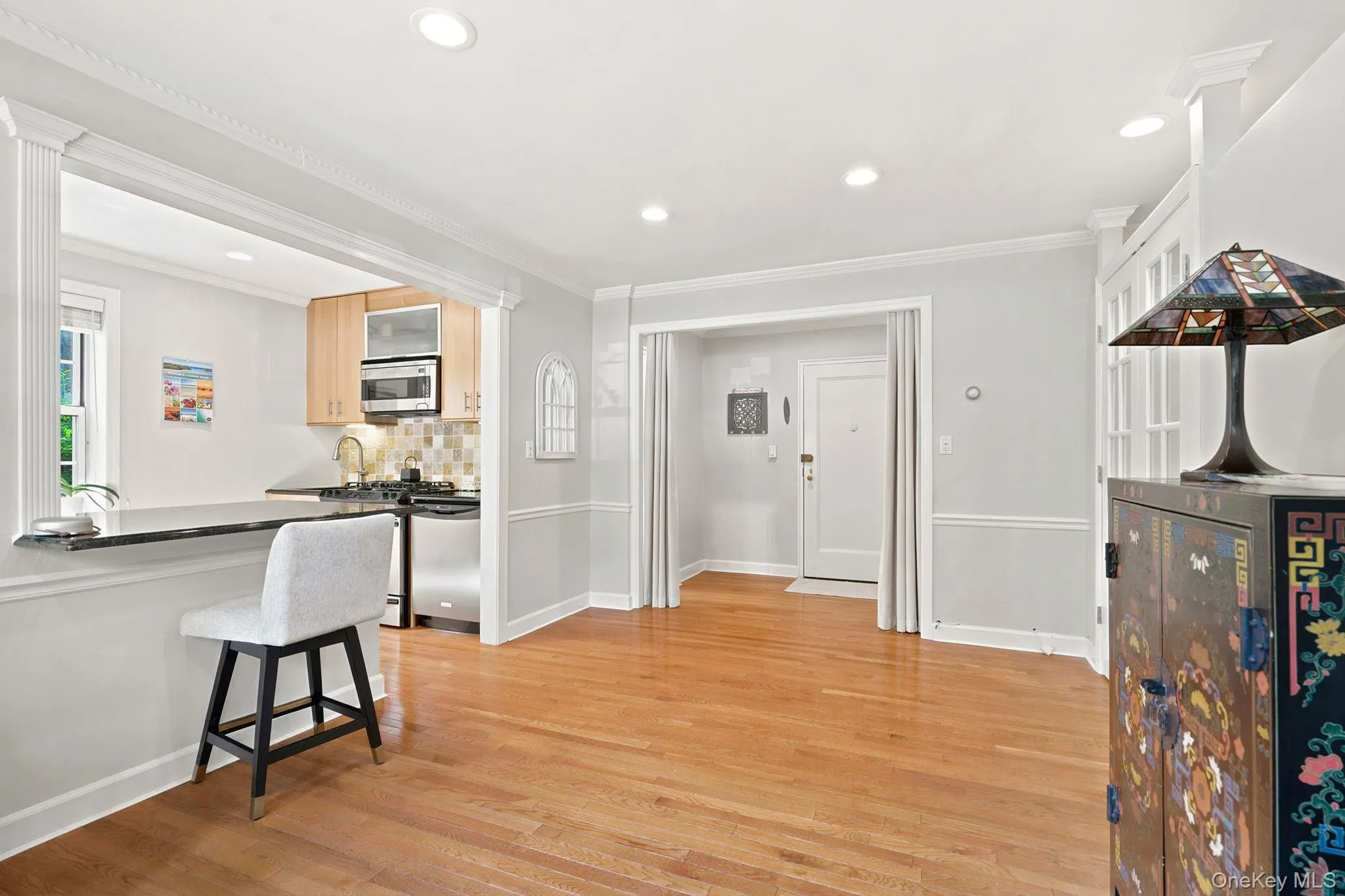 Living space is open to the kitchen. Eat-up bar makes entertaining easy. Living space is open to the kitchen. Eat-up bar makes entertaining easy.