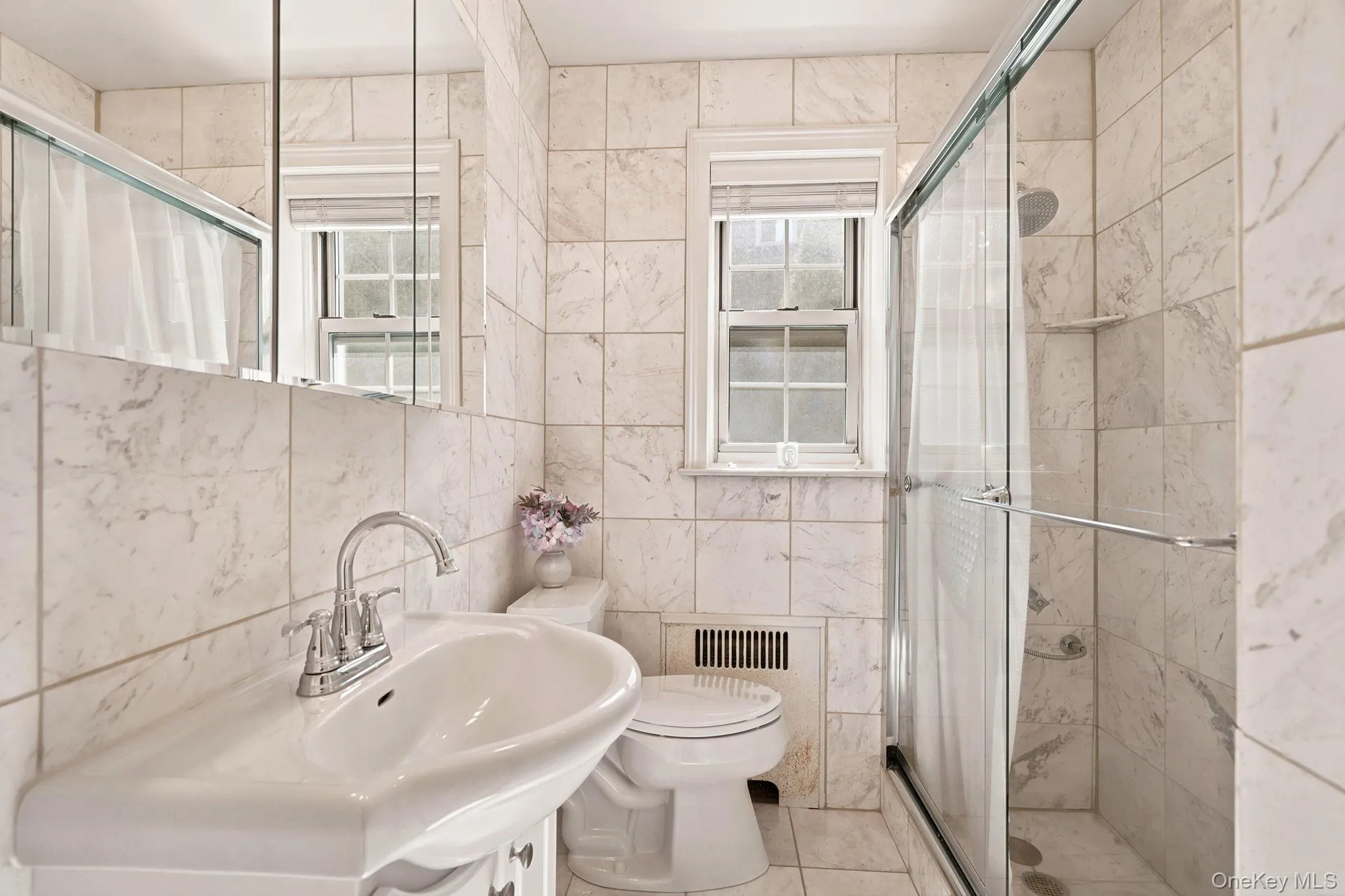 Full bathroom with easy access walk-in shower. Full bathroom with easy access walk-in shower.