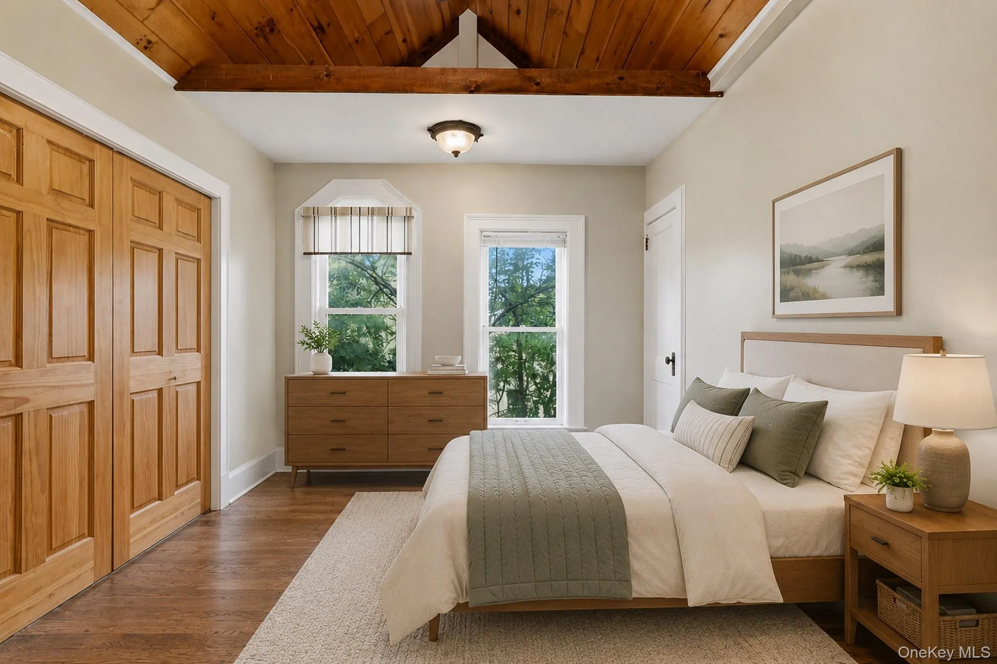 Virtually Staged. Bedroom two features vaulted ceilings, floor to ceiling windows, hardwood floors and plenty of room for everything you need to make this space your own. Virtually Staged. Bedroom two features vaulted ceilings, floor to ceiling windows, hardwood floors and plenty of room for everything you need to make this space your own.