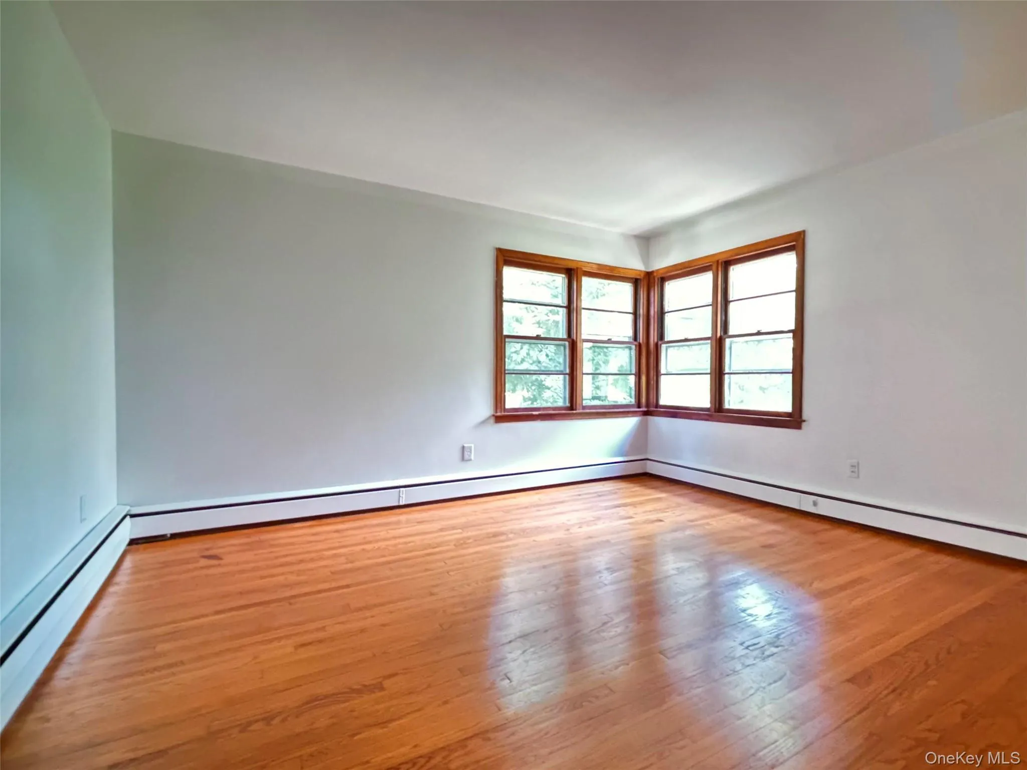 Primary Bedroom with lovely hard wood floor Primary Bedroom with lovely hard wood floor