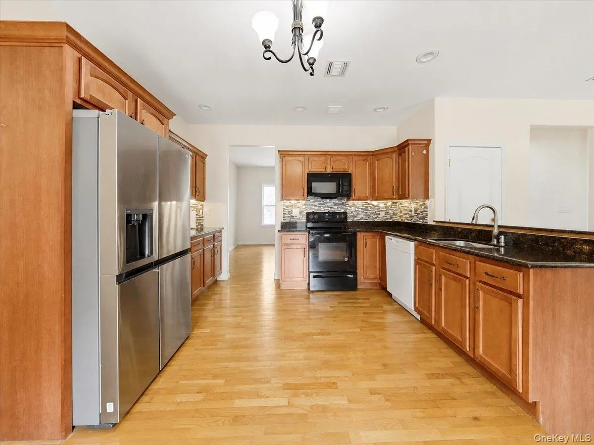 KITCHEN LEADING TO DINING ROOM KITCHEN LEADING TO DINING ROOM