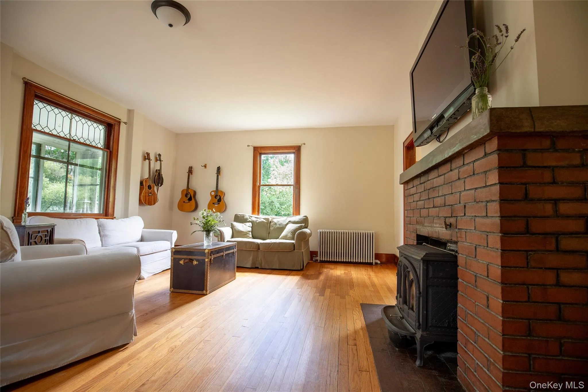 Fireplace, original trim. Fireplace, original trim.