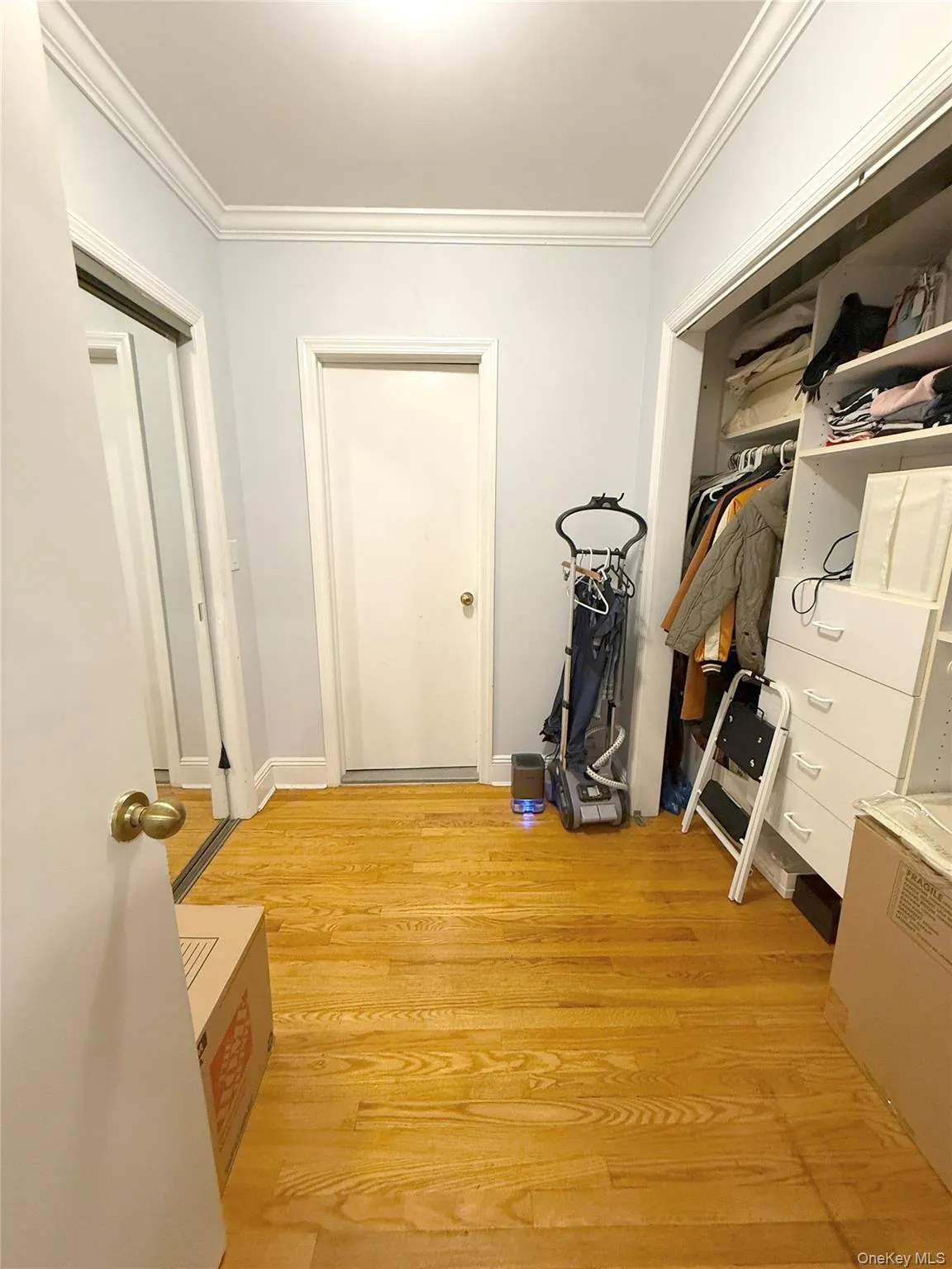 walker in closet in the master bedroom walker in closet in the master bedroom