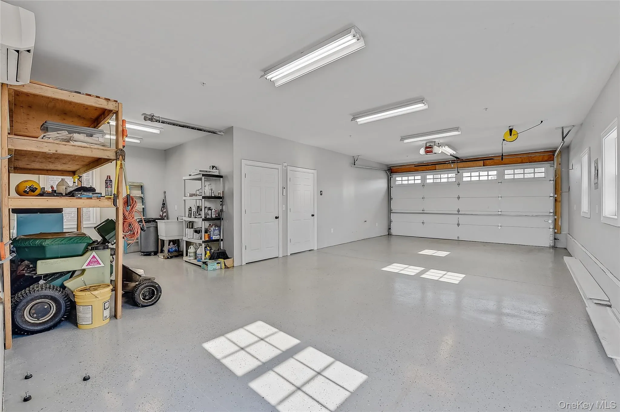 Garage with a wall mounted air conditioner Garage with a wall mounted air conditioner