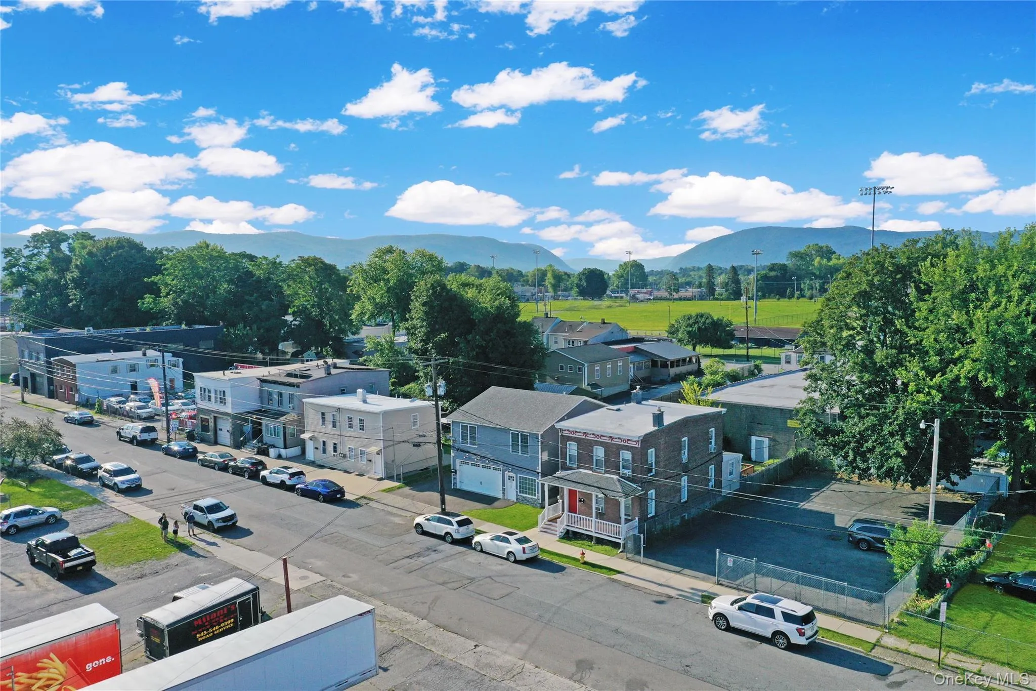 Aerial view of residential area with a mountain backdrop Aerial view of residential area with a mountain backdrop