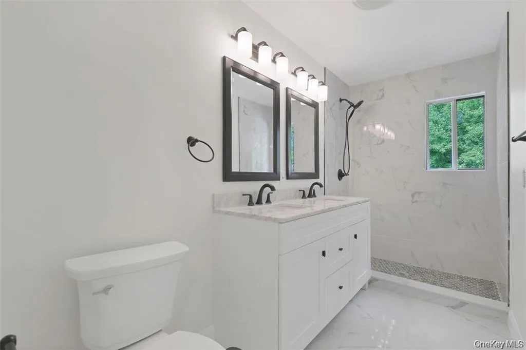 A fresh and updated full bathroom with modern fixtures, clean finishes, and a polished, move-in-ready feel. A fresh and updated full bathroom with modern fixtures, clean finishes, and a polished, move-in-ready feel.