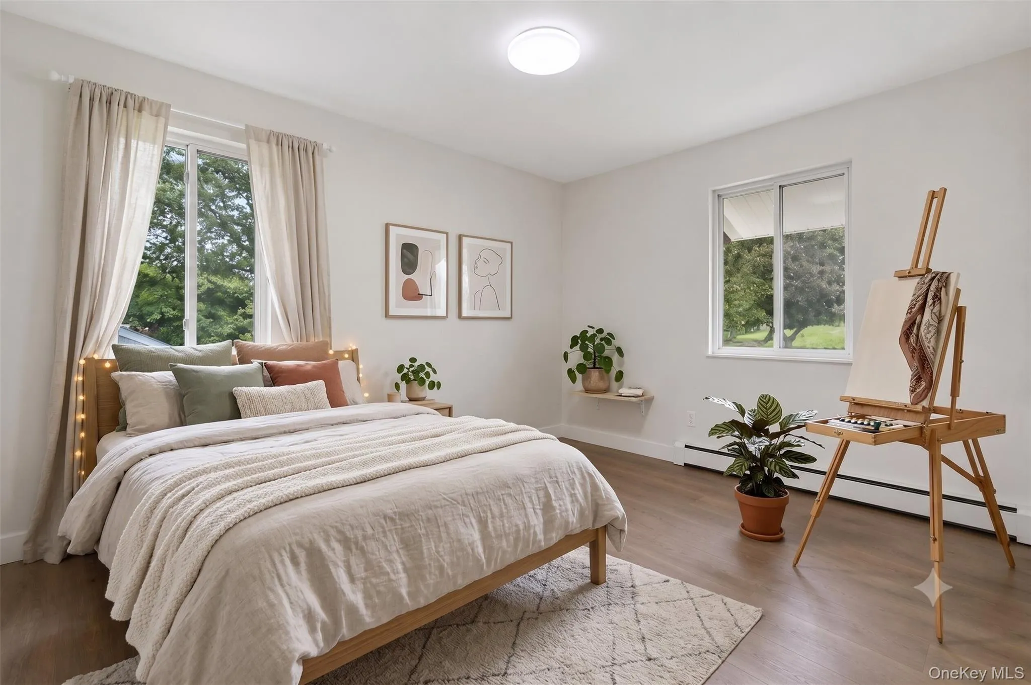 Virtually staged bedroom 2: Acomfortable secondarybedroom with great naturallight and flexible space forfamily, guests, or a home officesetup. Virtually staged bedroom 2: Acomfortable secondarybedroom with great naturallight and flexible space forfamily, guests, or a home officesetup.