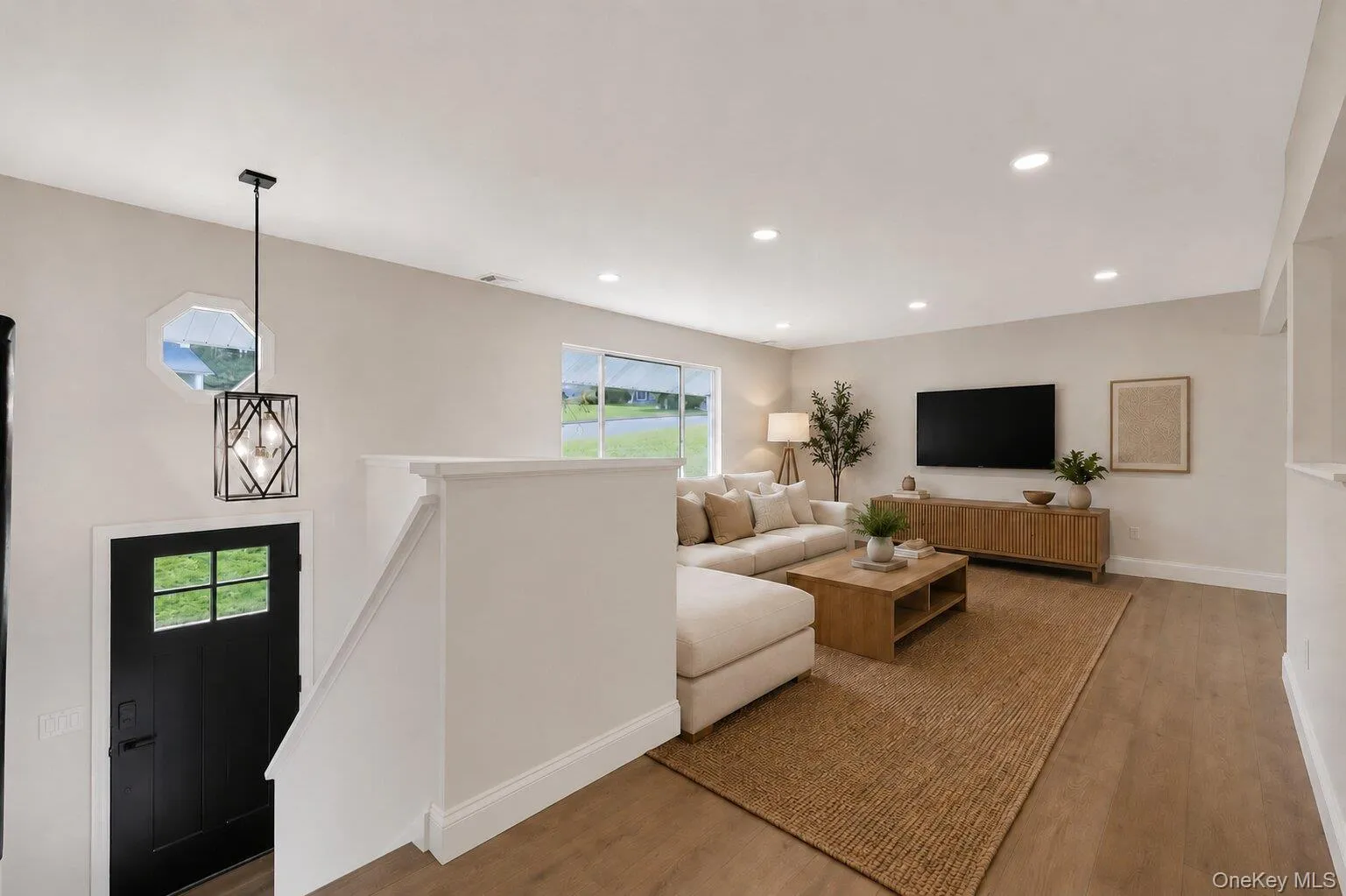 Virtually staged living room: Abright and welcoming livingroom with a comfortablelayout, great natural light, andplenty of space to relax,gather, or entertain. Virtually staged living room: Abright and welcoming livingroom with a comfortablelayout, great natural light, andplenty of space to relax,gather, or entertain.