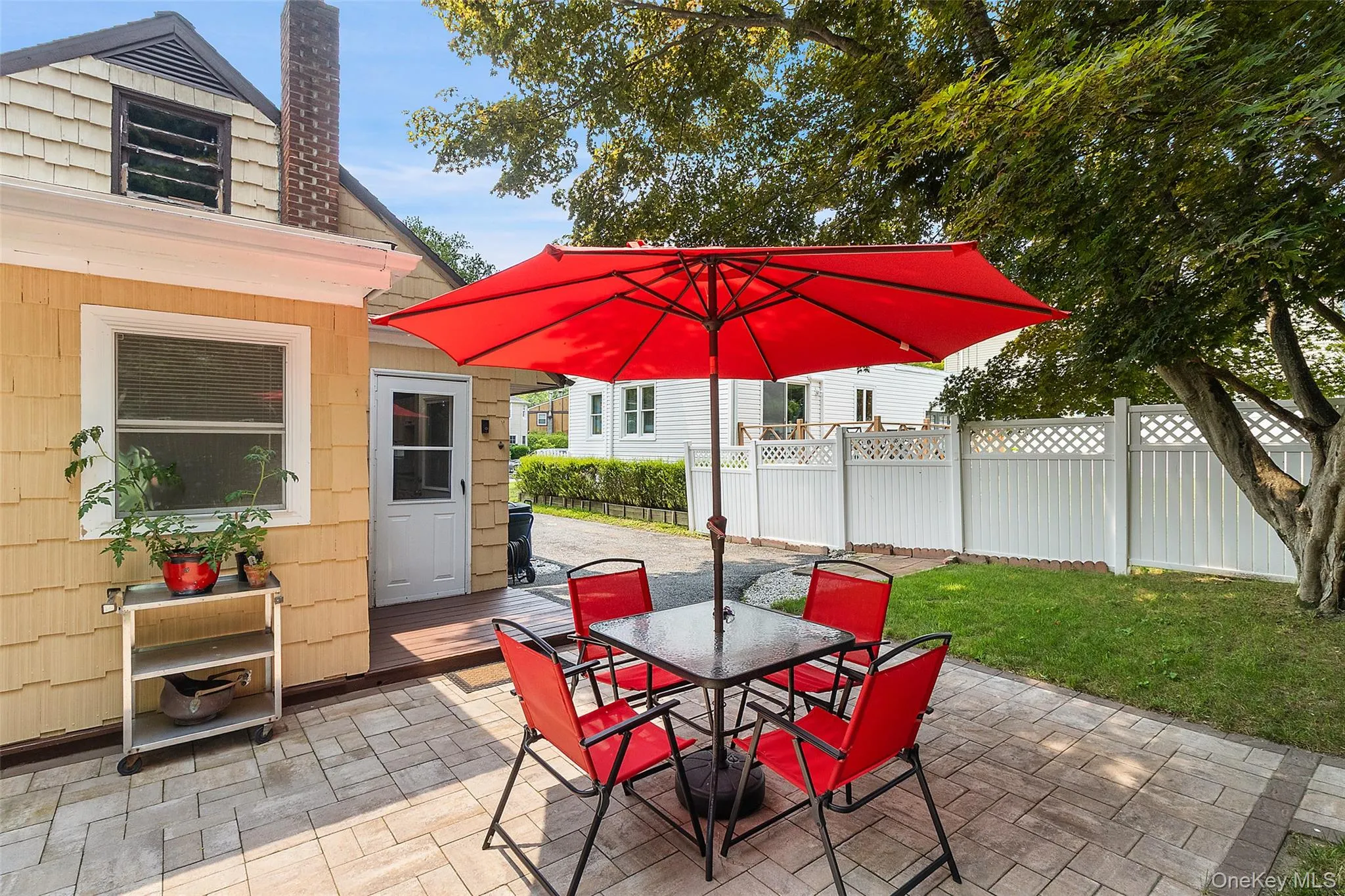 Rear patio featuring paver stone hardscaping Rear patio featuring paver stone hardscaping