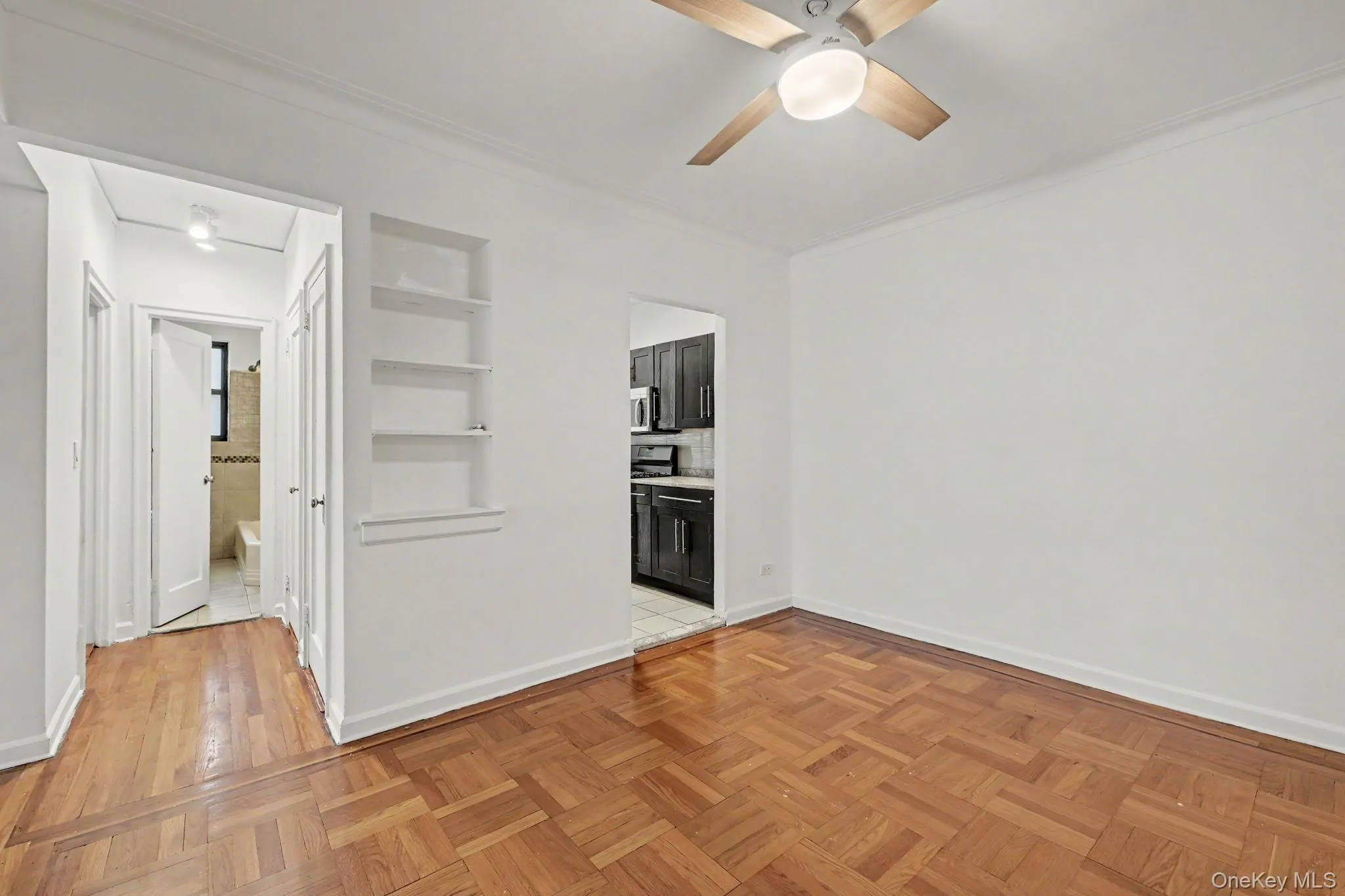 Dining area with hallway to bath on left. Dining area with hallway to bath on left.
