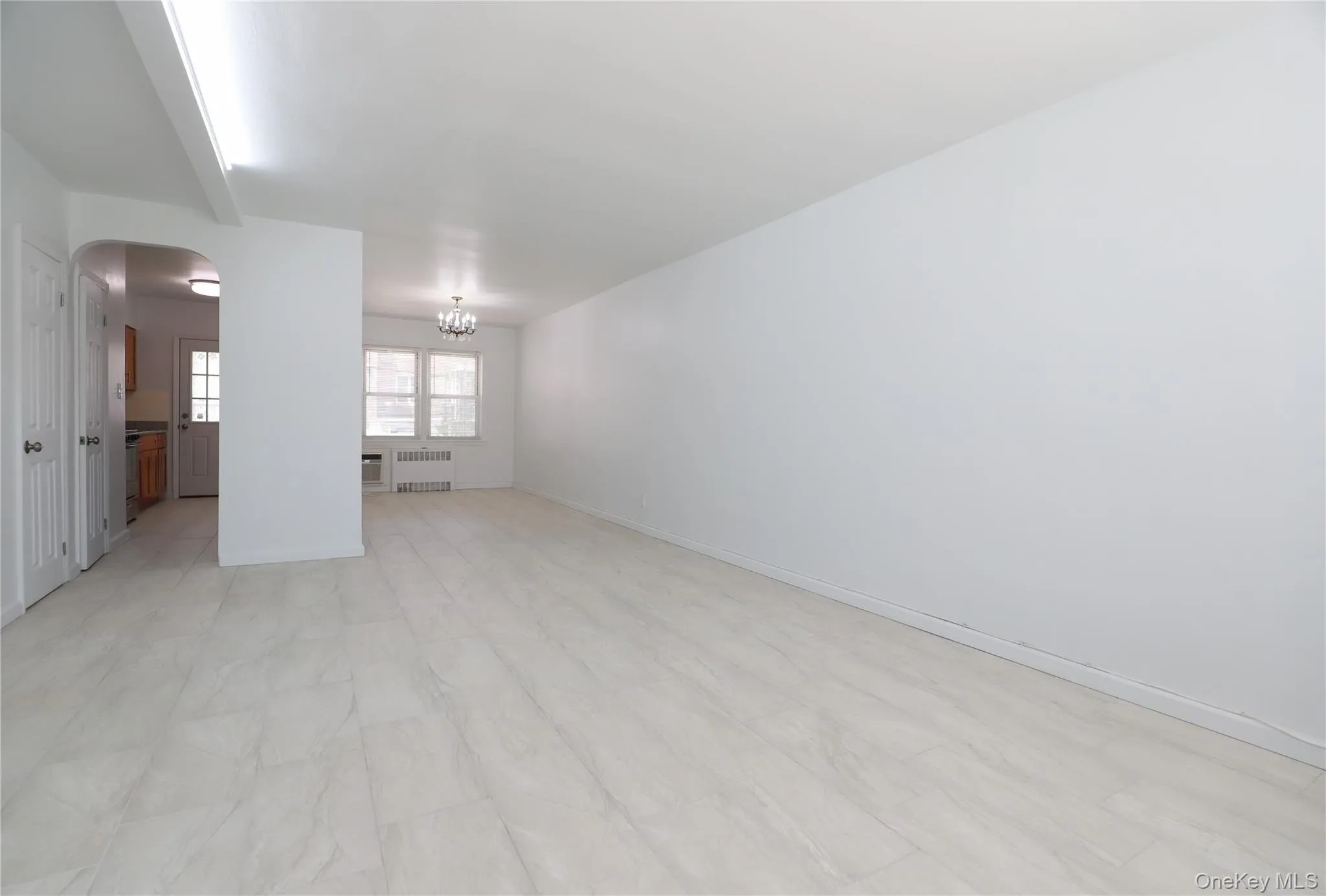 Bright and spacious living and dining area with an open layout and convenient access to the kitchen Bright and spacious living and dining area with an open layout and convenient access to the kitchen
