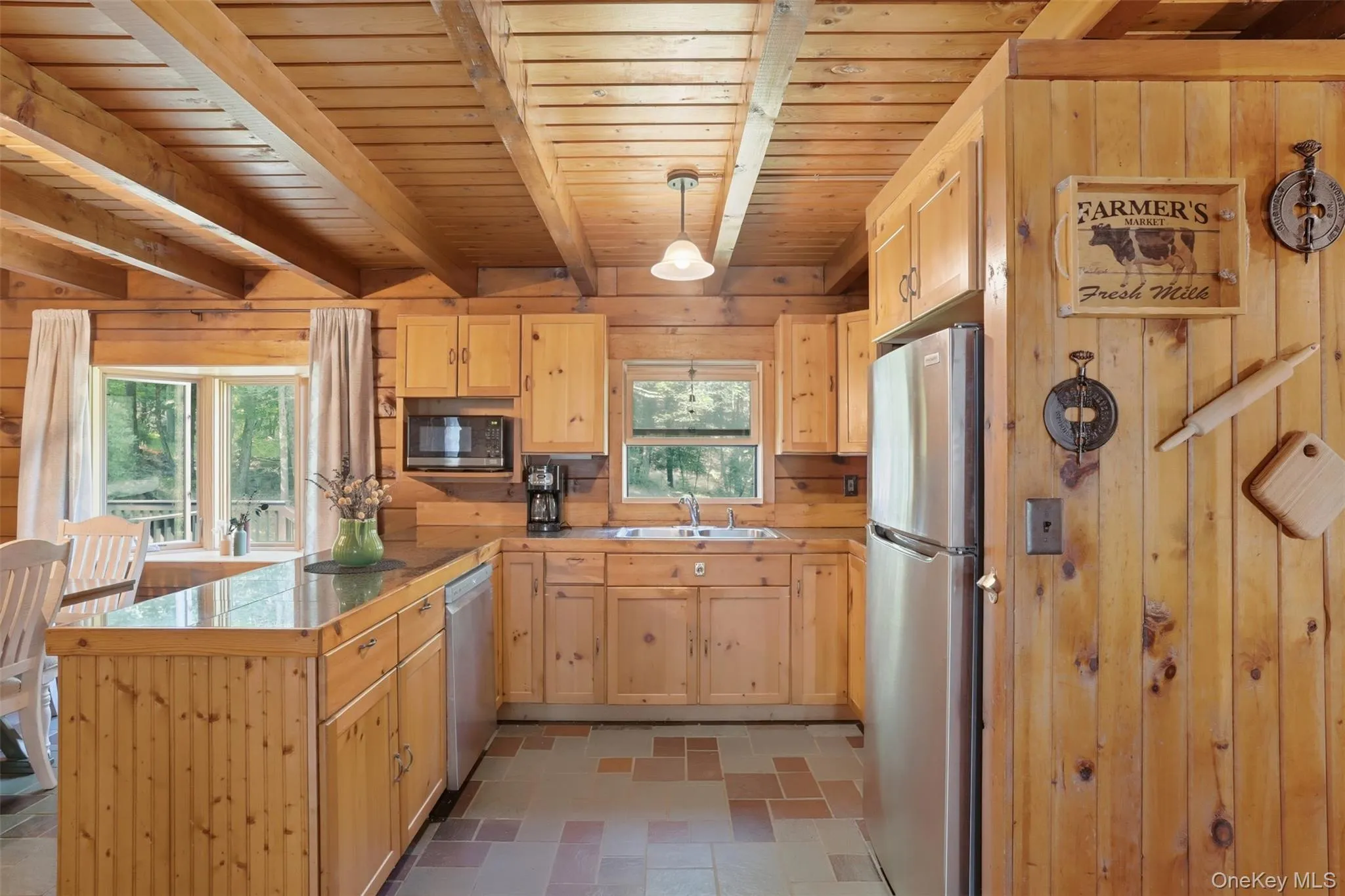 Open kitchen with newer appliances and wood appliances Open kitchen with newer appliances and wood appliances