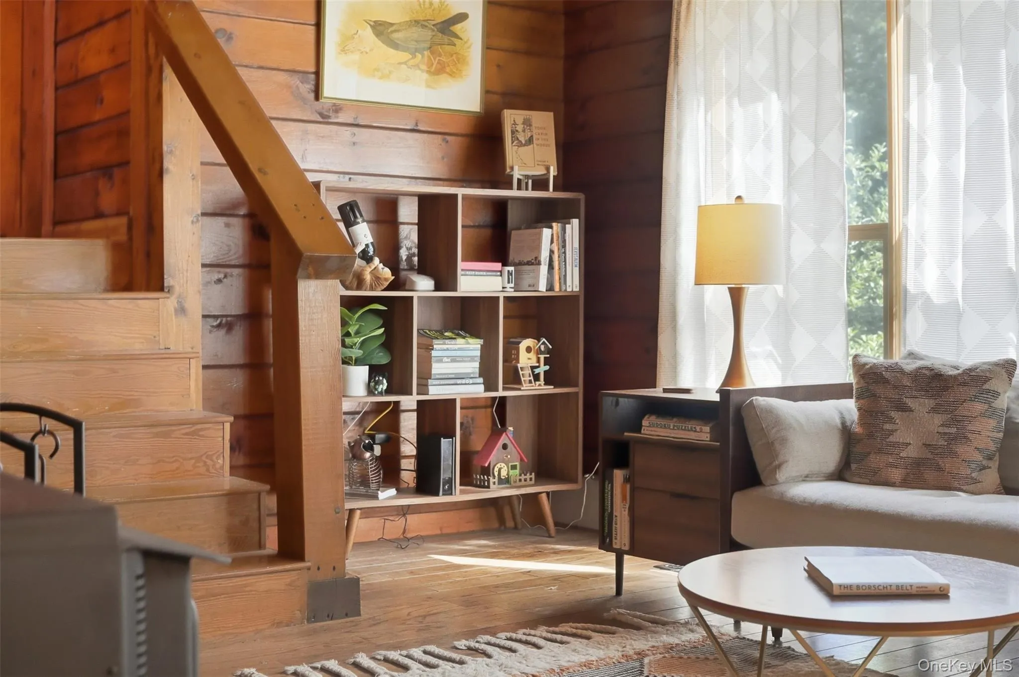 High ceilings, big bright windows, rich hardwood floors and a handsome fireplace make this the heart of the home High ceilings, big bright windows, rich hardwood floors and a handsome fireplace make this the heart of the home