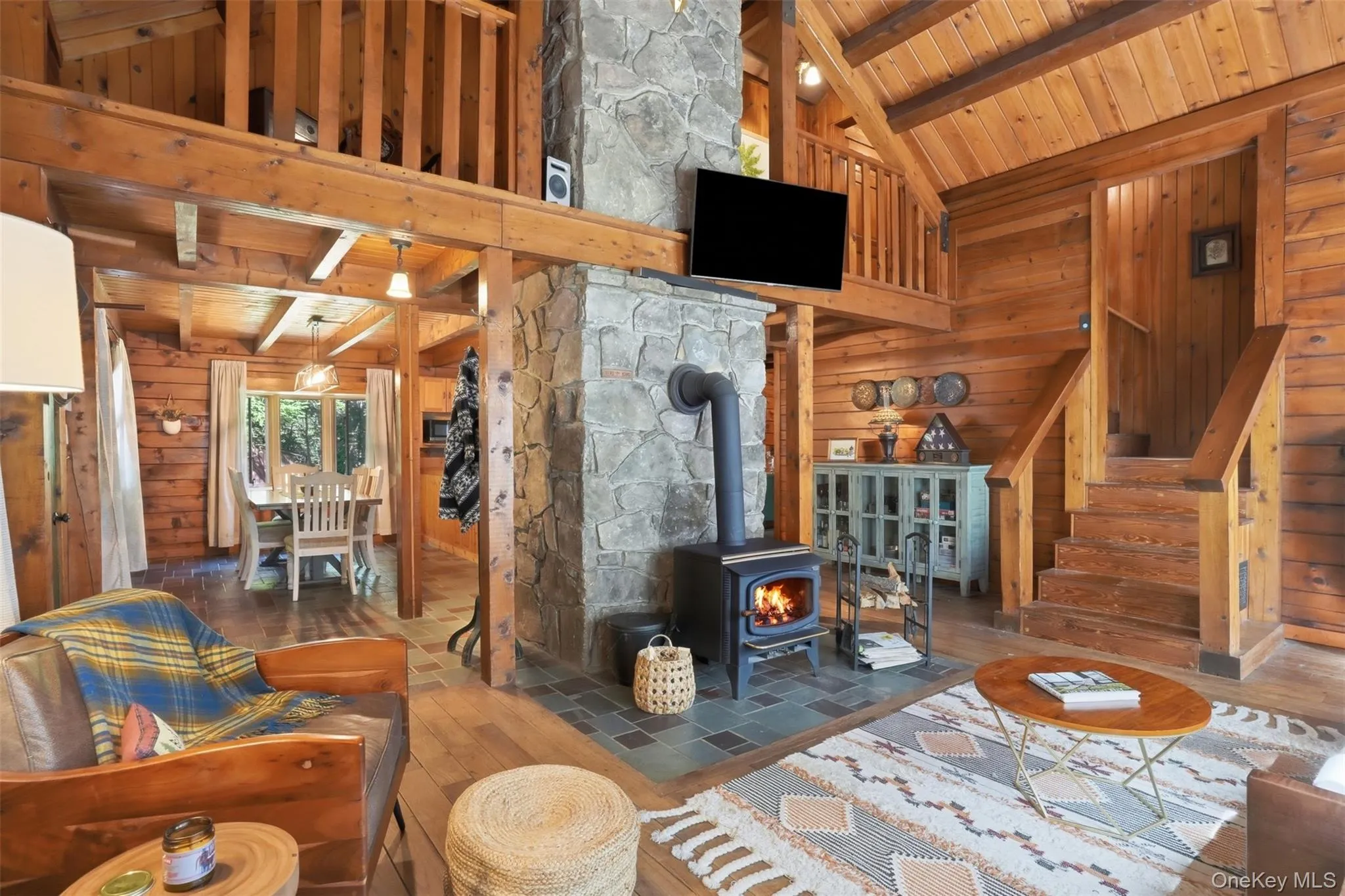 High ceilings, big bright windows, rich hardwood floors and a handsome fireplace make this the heart of the home High ceilings, big bright windows, rich hardwood floors and a handsome fireplace make this the heart of the home