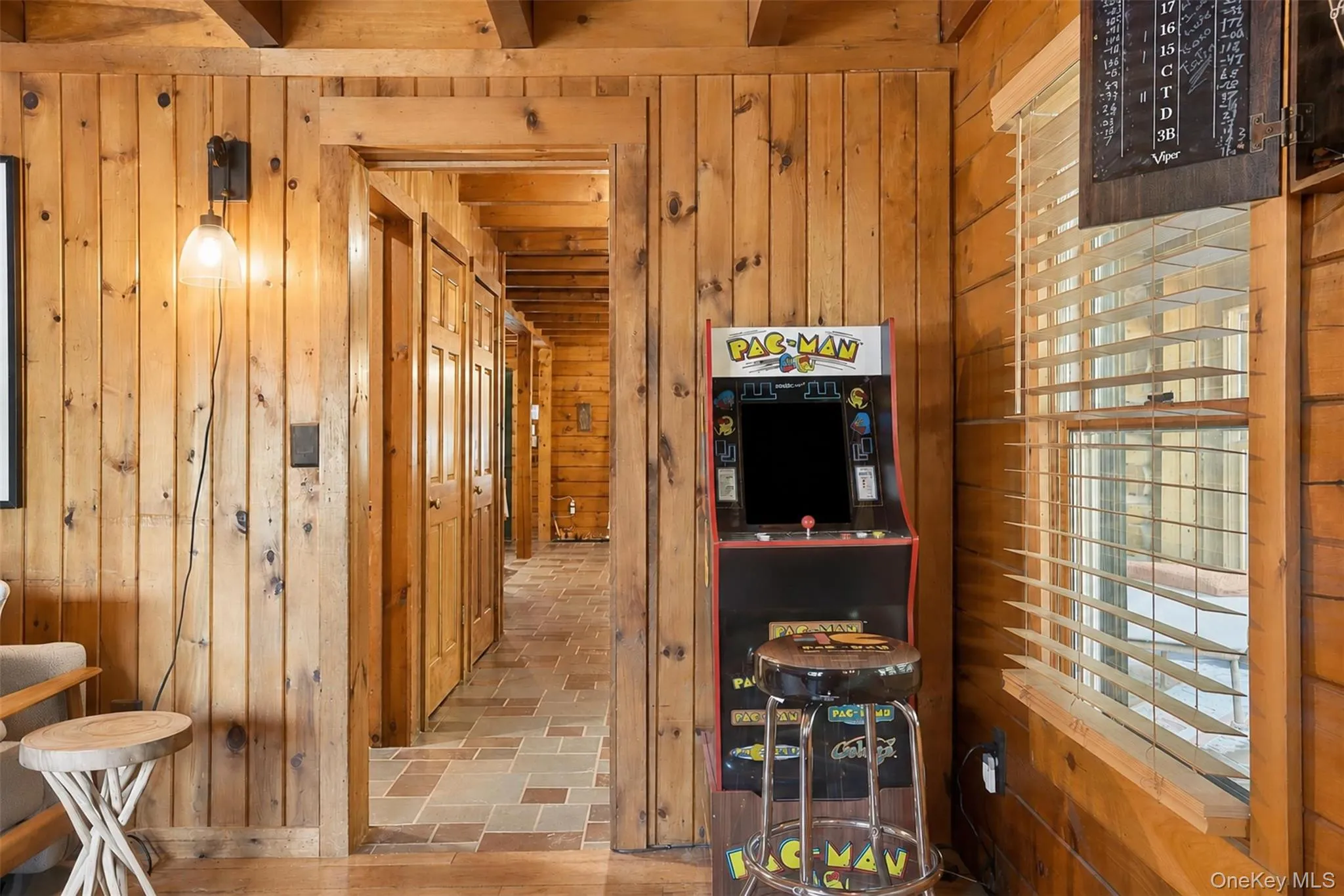 Currently setup as a den with games but has the potential and space to be a bedroom, home office or hobby space Currently setup as a den with games but has the potential and space to be a bedroom, home office or hobby space