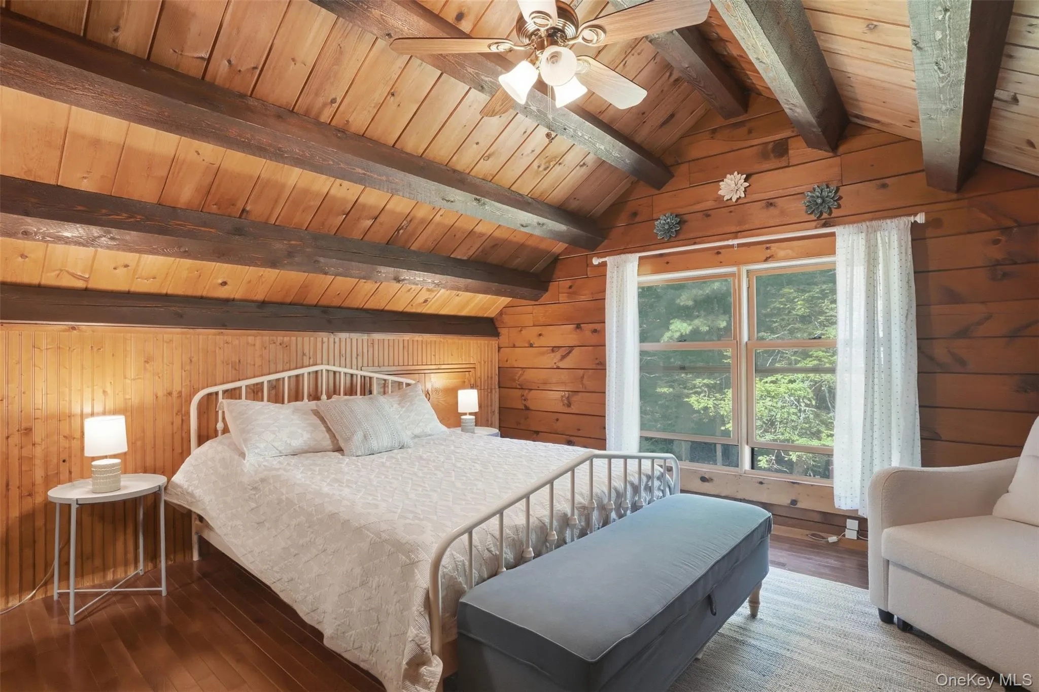 1 of 2 bedrooms on the 2nd level. Beautiful exposed wood and big window. 1 of 2 bedrooms on the 2nd level. Beautiful exposed wood and big window.