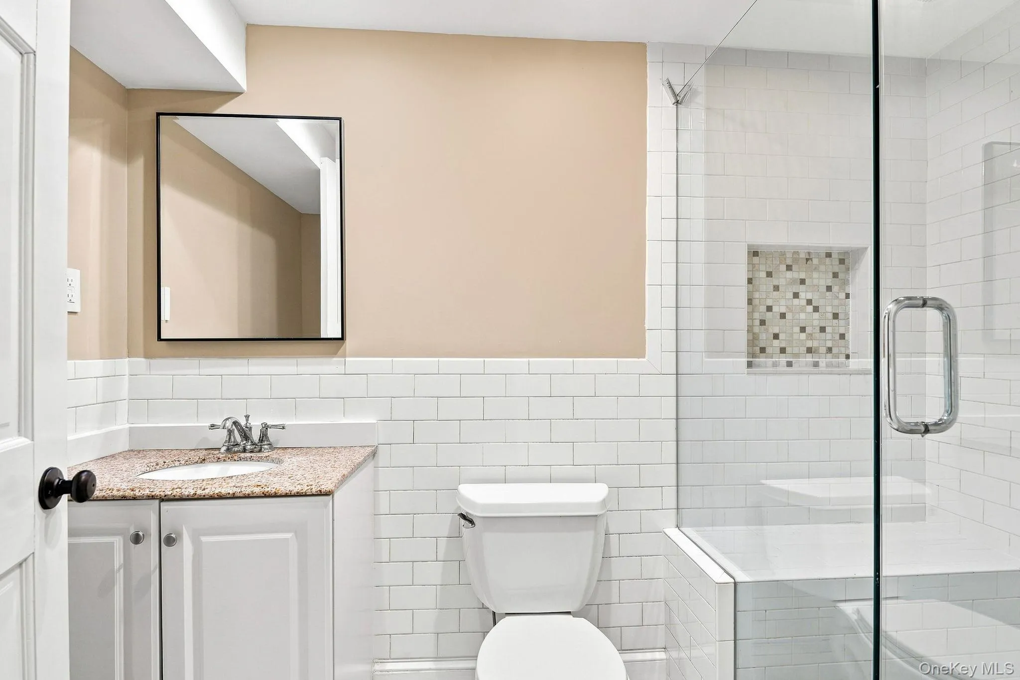 Lower-Level Bathroom. Lower-Level Bathroom.