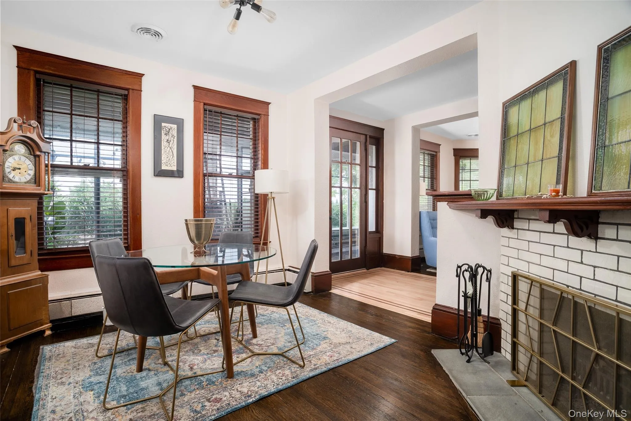 Dining area with wood burning fireplace. Dining area with wood burning fireplace.