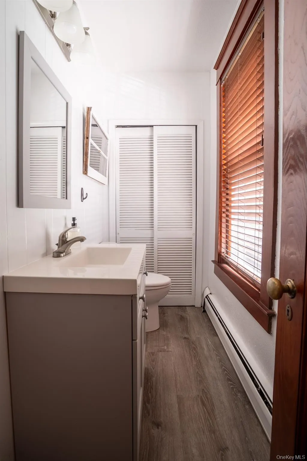 Half bathroom on 1st floor. Half bathroom on 1st floor.