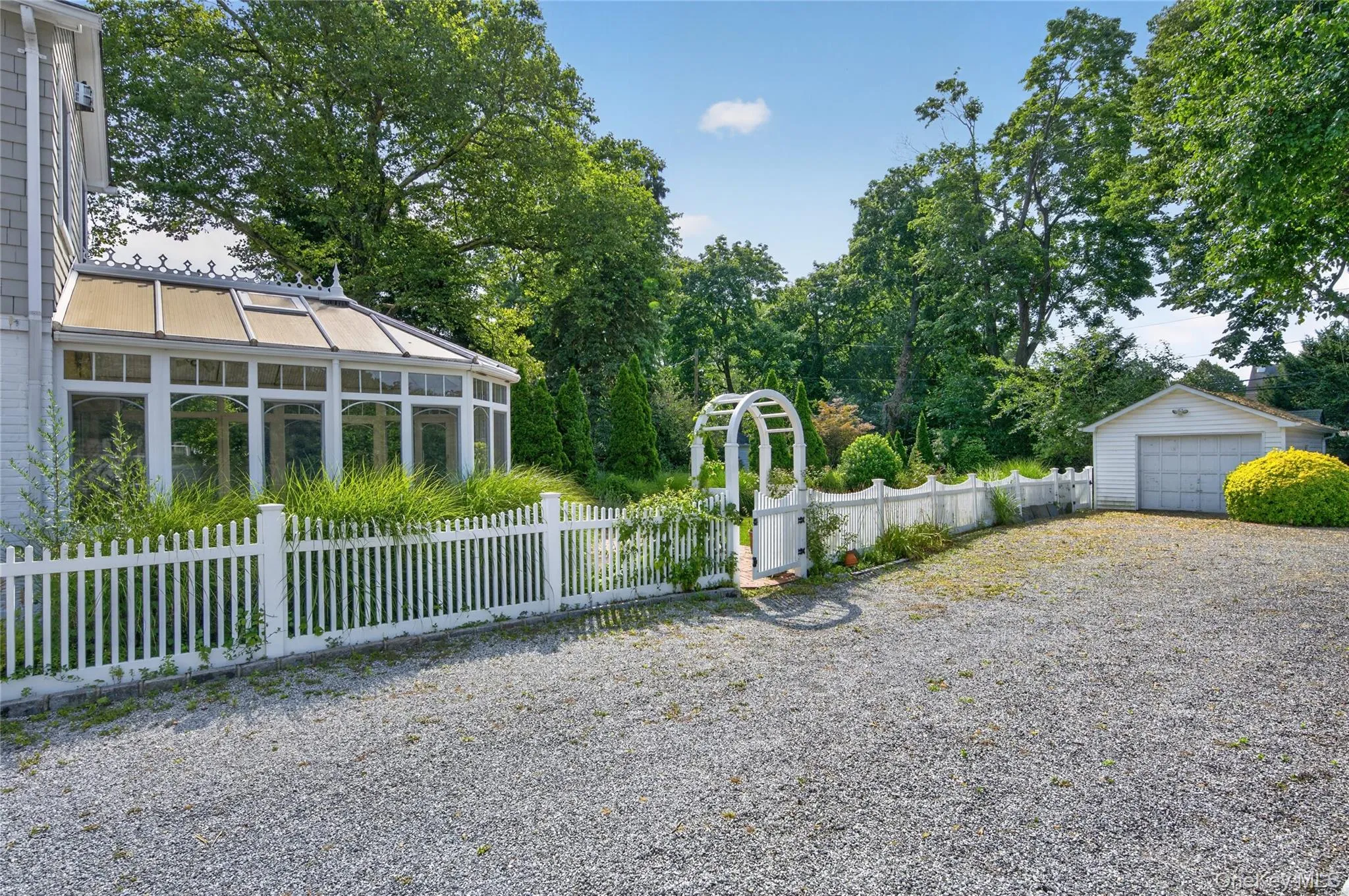 Backyard, shared driveway, 1-car garage Backyard, shared driveway, 1-car garage