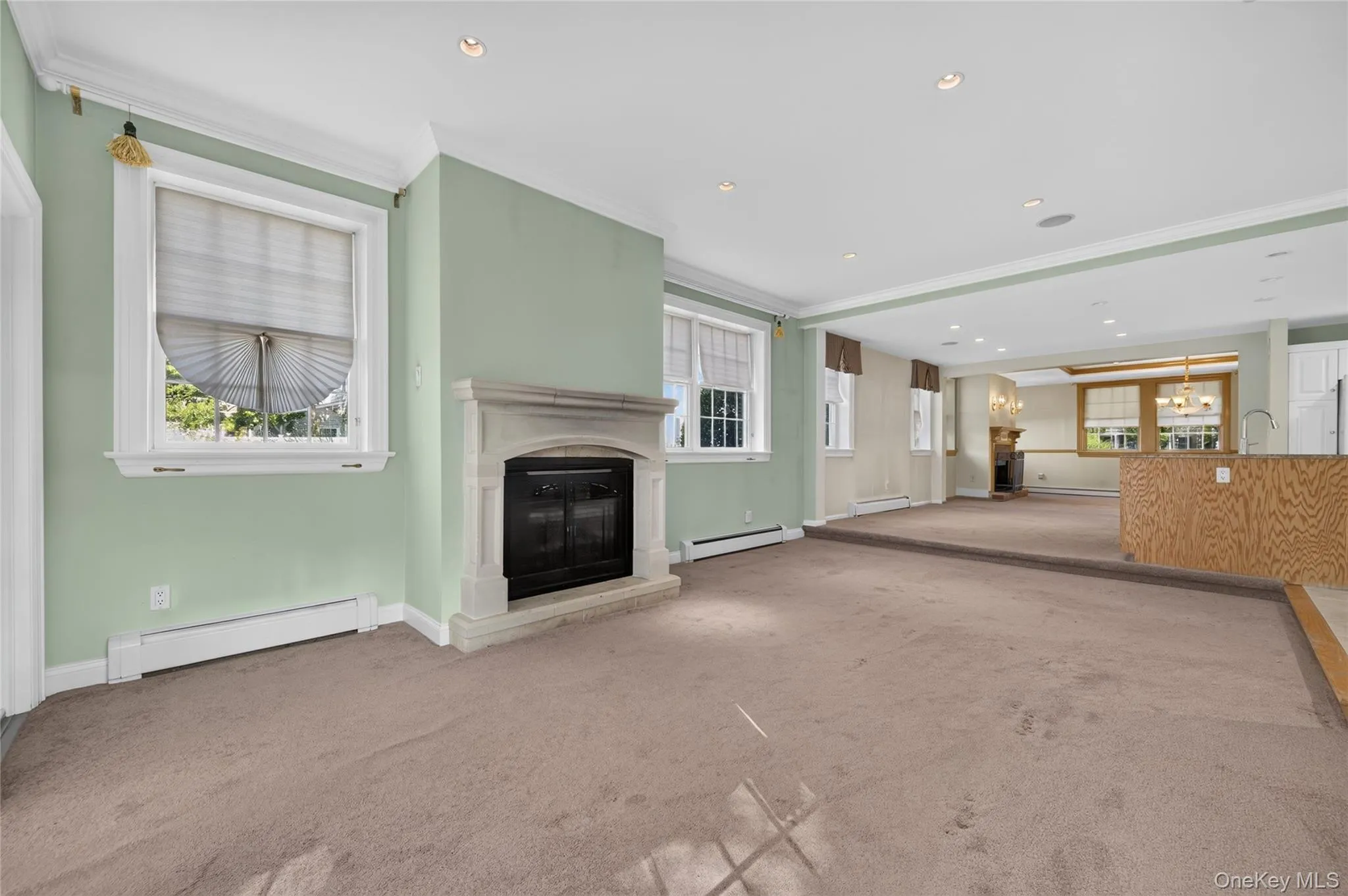 Living Room with gas fireplace; breakfast area of Kitchen Living Room with gas fireplace; breakfast area of Kitchen