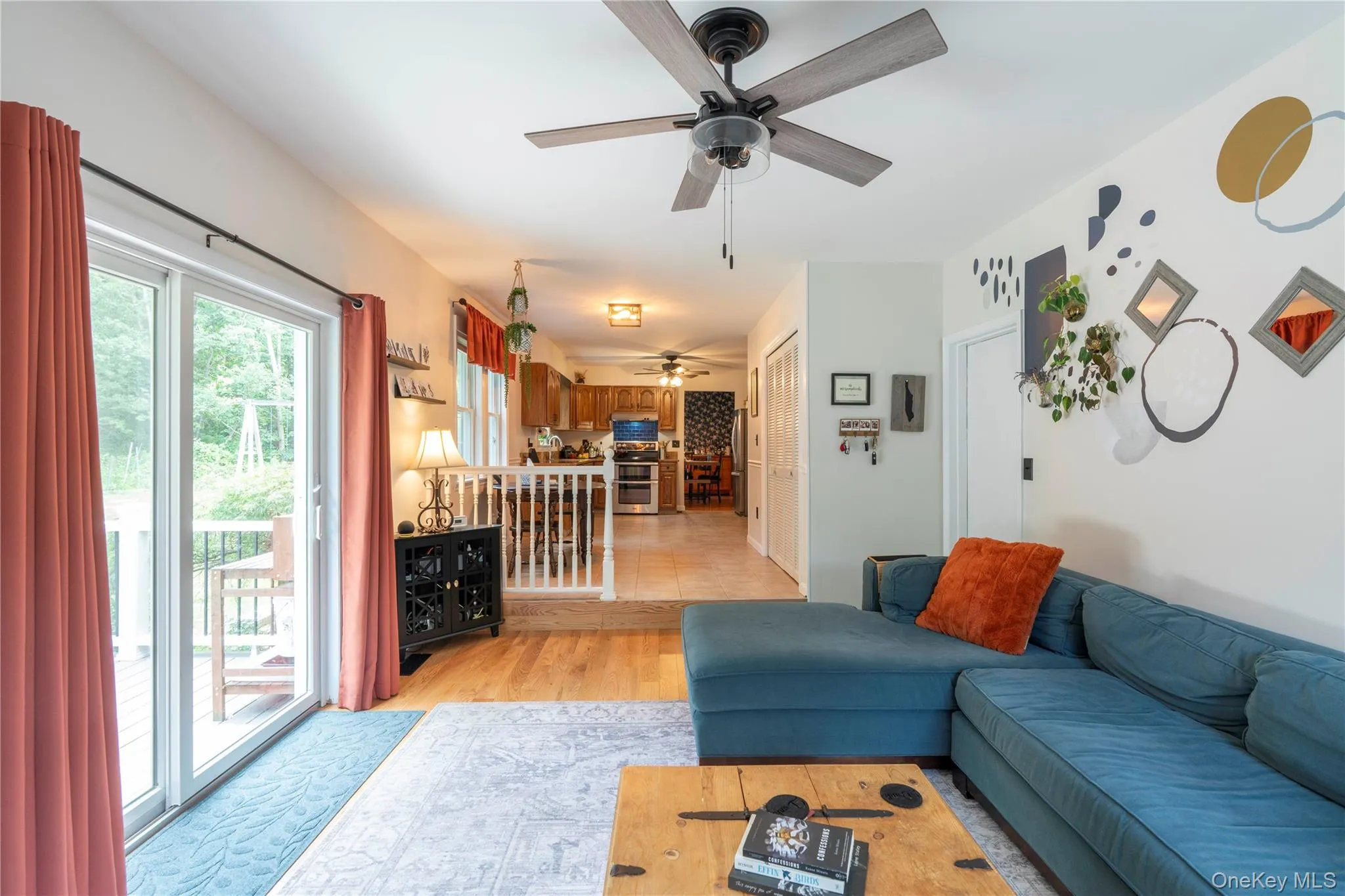 Step down into the Family Room with a big slider that opens to the deck and easy access to the kitchen's eating area Step down into the Family Room with a big slider that opens to the deck and easy access to the kitchen's eating area