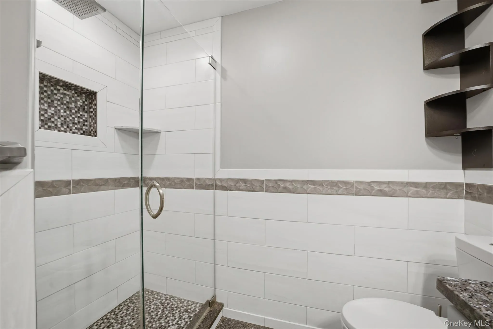 Glass stand up shower in hallway bathroom Glass stand up shower in hallway bathroom