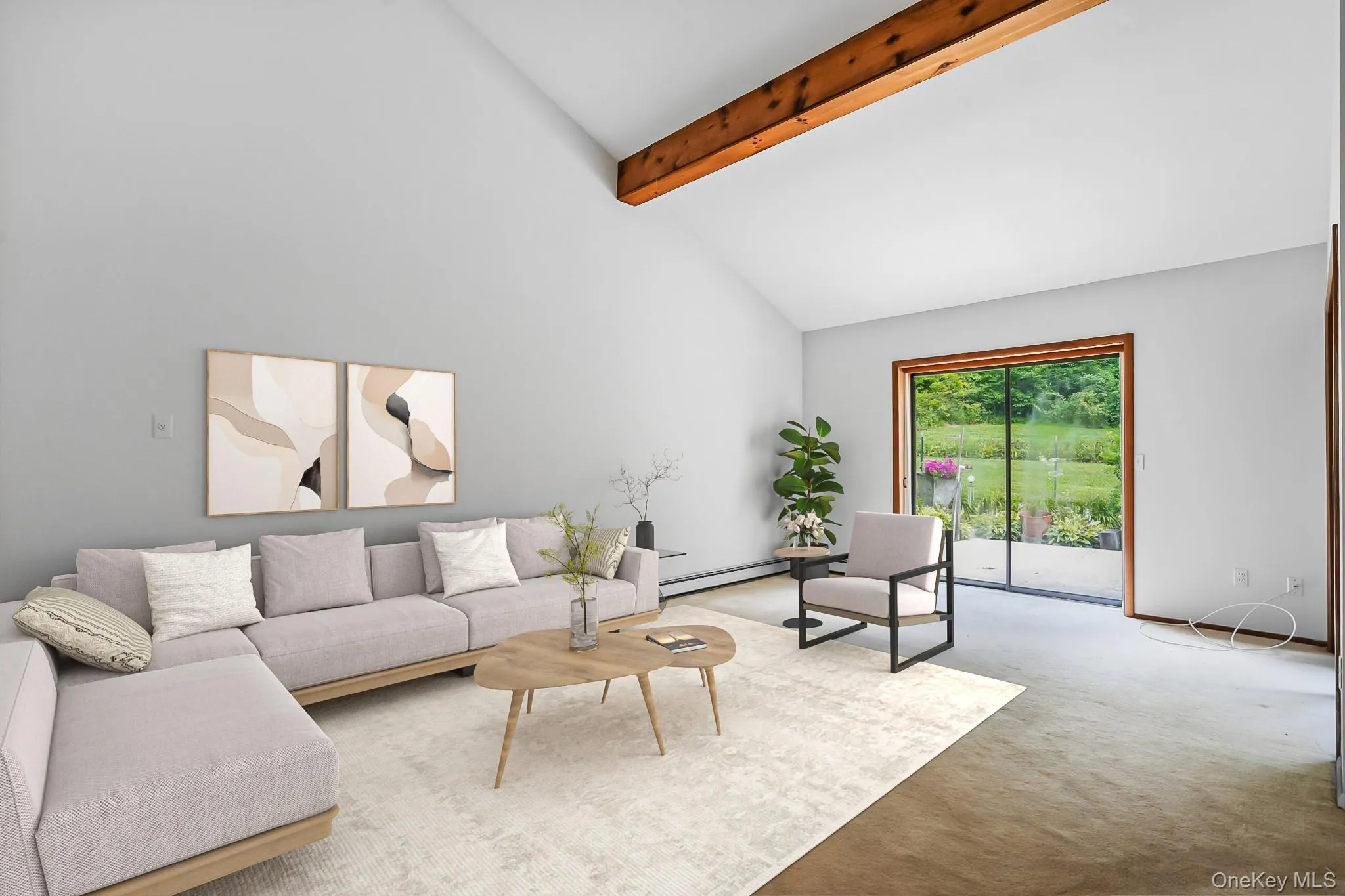 Vaulted ceiling with exposed wood beam, light gray walls, and sliding glass door Vaulted ceiling with exposed wood beam, light gray walls, and sliding glass door