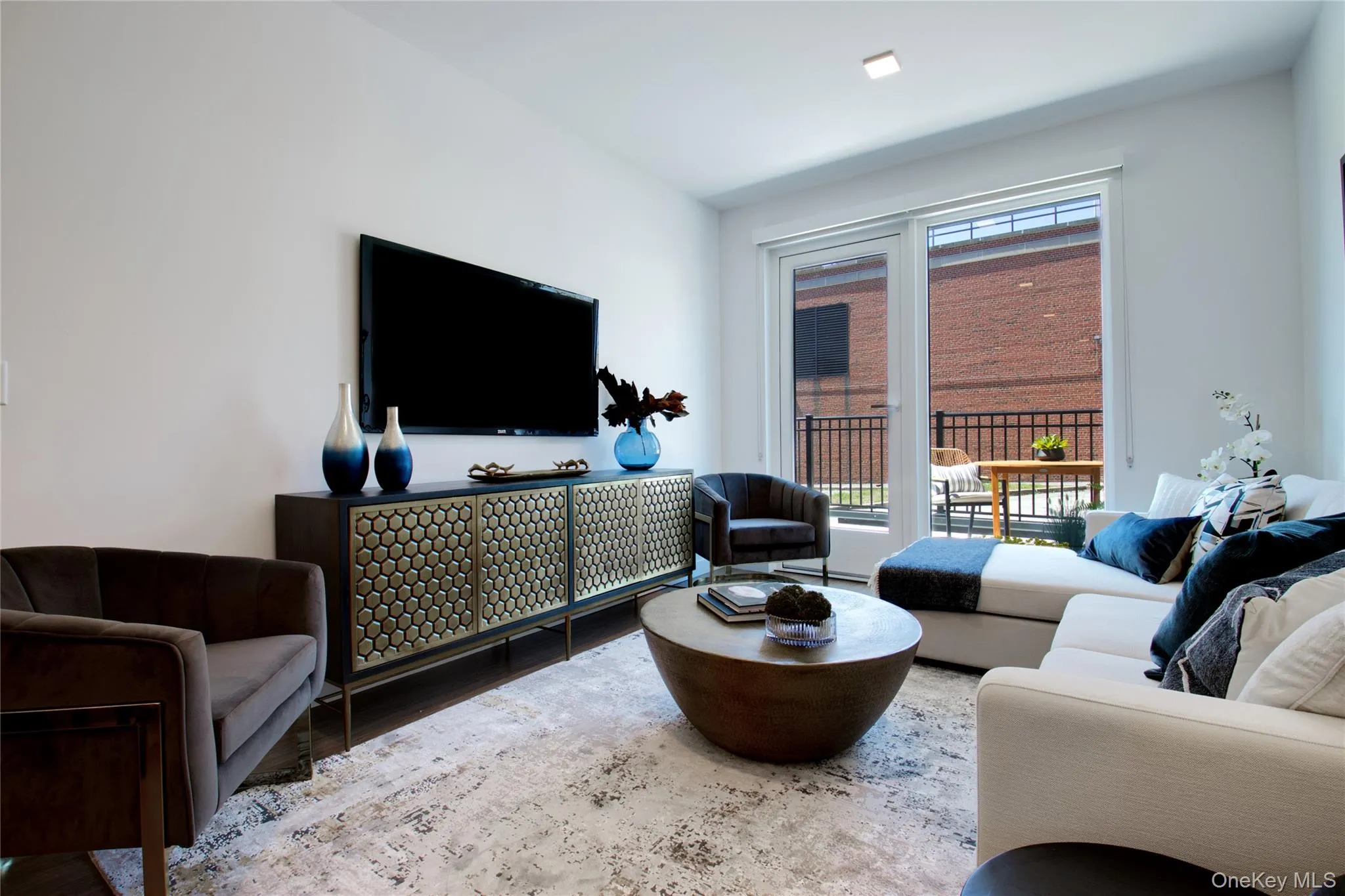 Living area featuring wood finished floors Living area featuring wood finished floors
