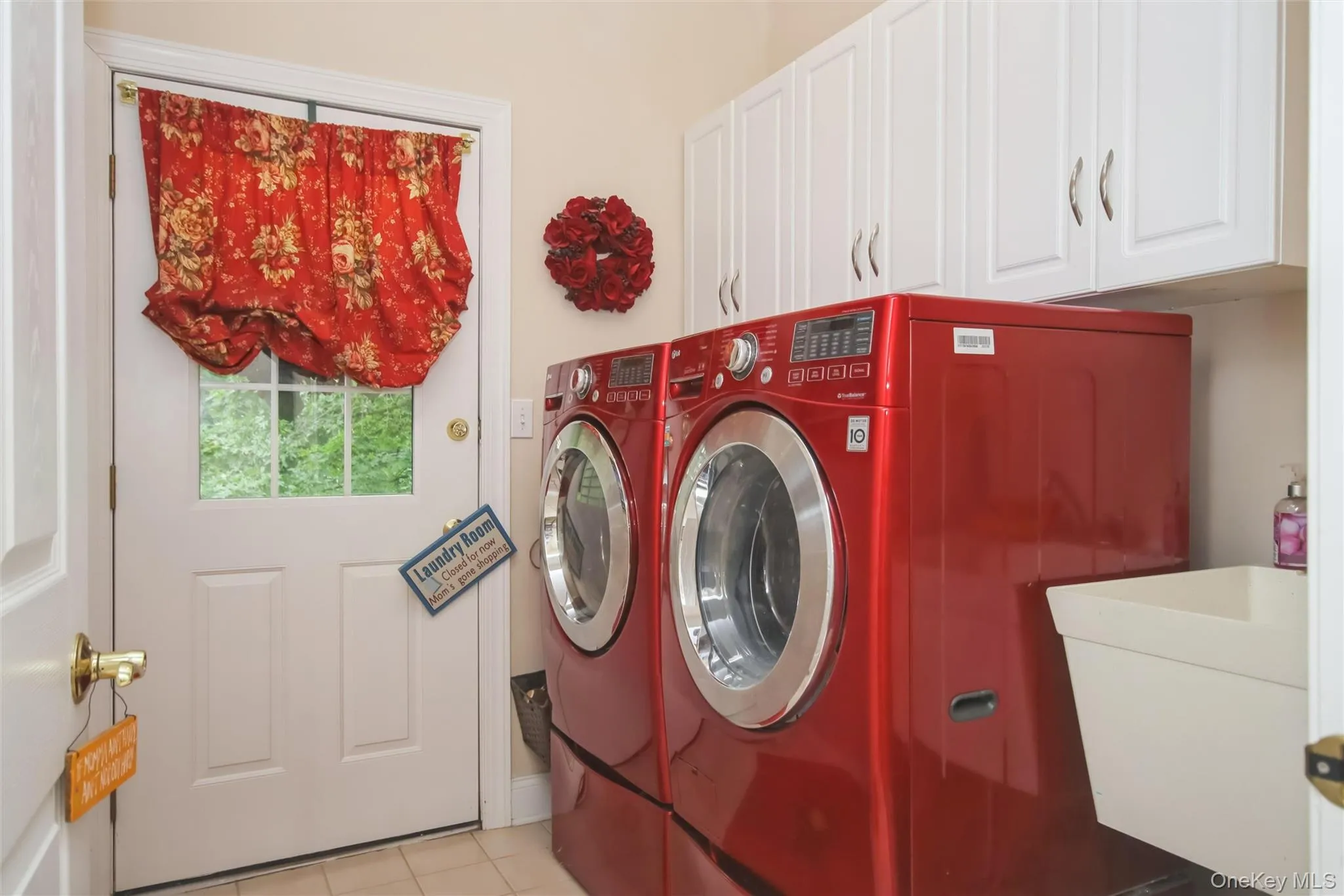 Laundry Room w/ slop sink & access to driveway Laundry Room w/ slop sink & access to driveway