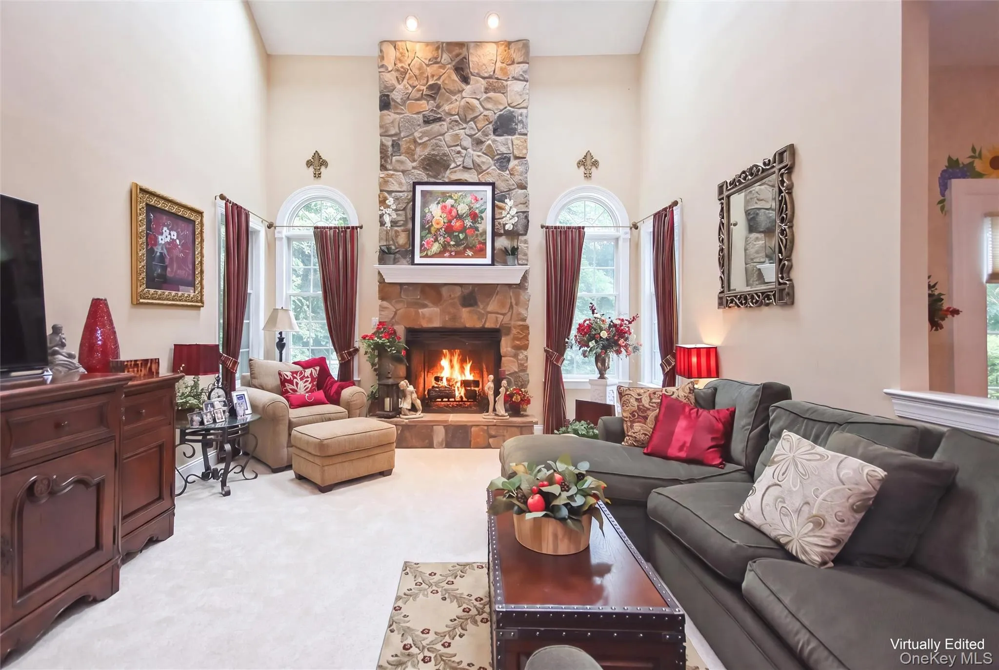 Family room w/ soaring stone gas fired fireplace Family room w/ soaring stone gas fired fireplace