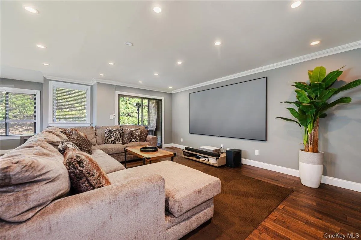 Wood flooring, crown and baseboard molding, recessed lighting and large windows. Wood flooring, crown and baseboard molding, recessed lighting and large windows.