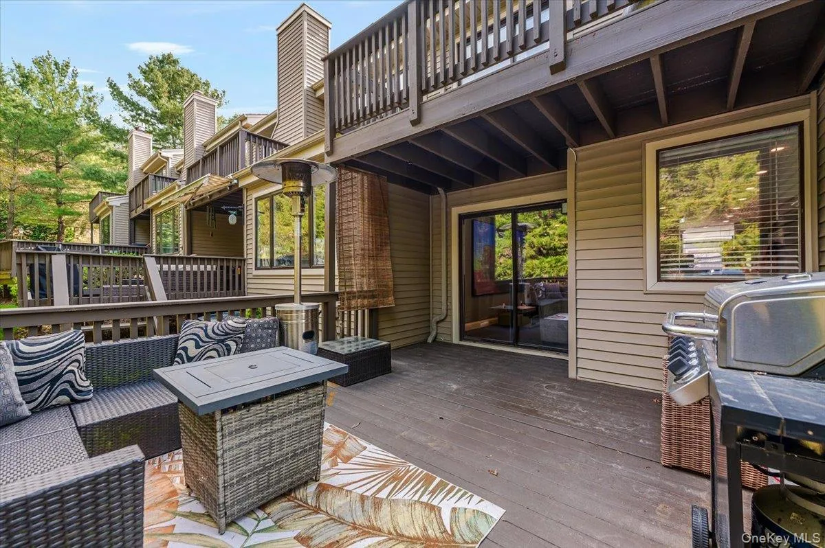 Wooden deck featuring outdoor lounge area Wooden deck featuring outdoor lounge area