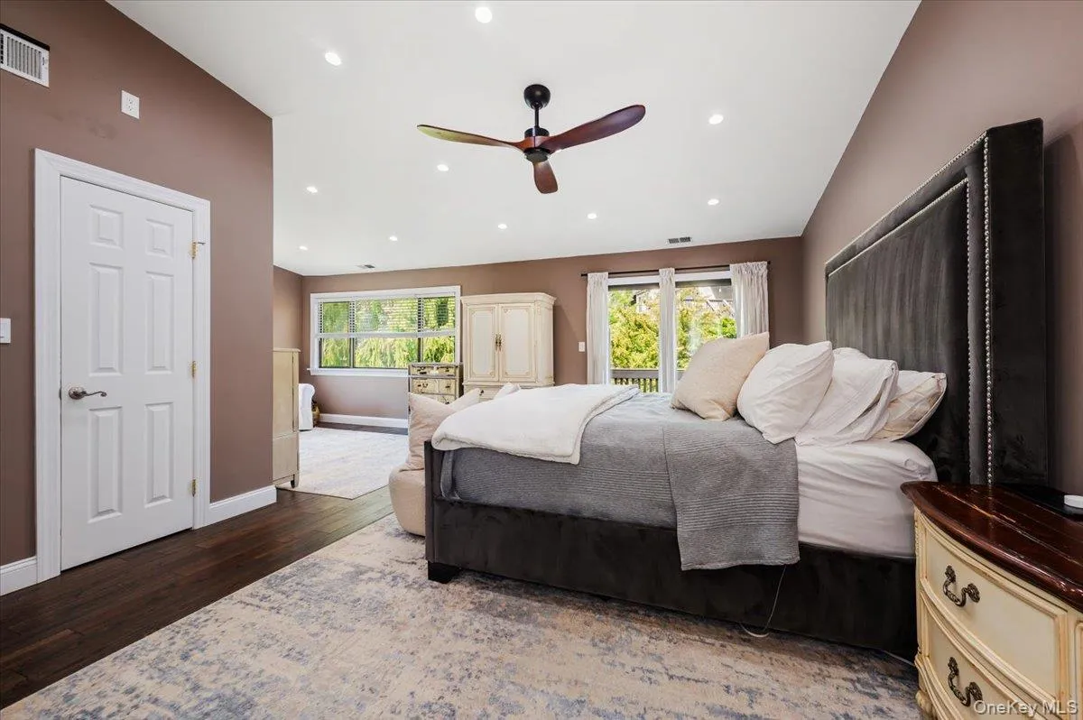 Primary bedroom is very large with wood flooring, large windows, plenty of storage. Primary bedroom is very large with wood flooring, large windows, plenty of storage.