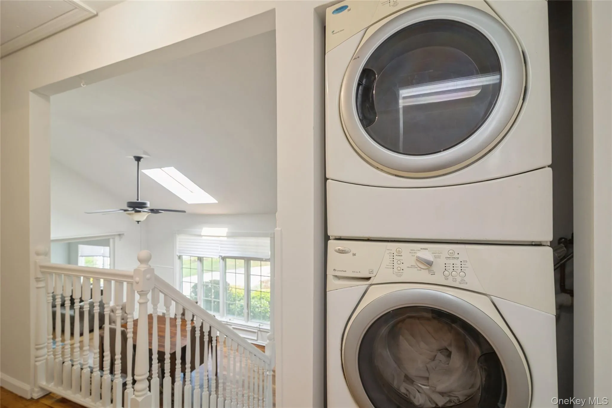 Upstairs Hallway Overlooks The Formal Living Room & Has The Washing Machine & Dryer On The Second Floor. Upstairs Hallway Overlooks The Formal Living Room & Has The Washing Machine & Dryer On The Second Floor.