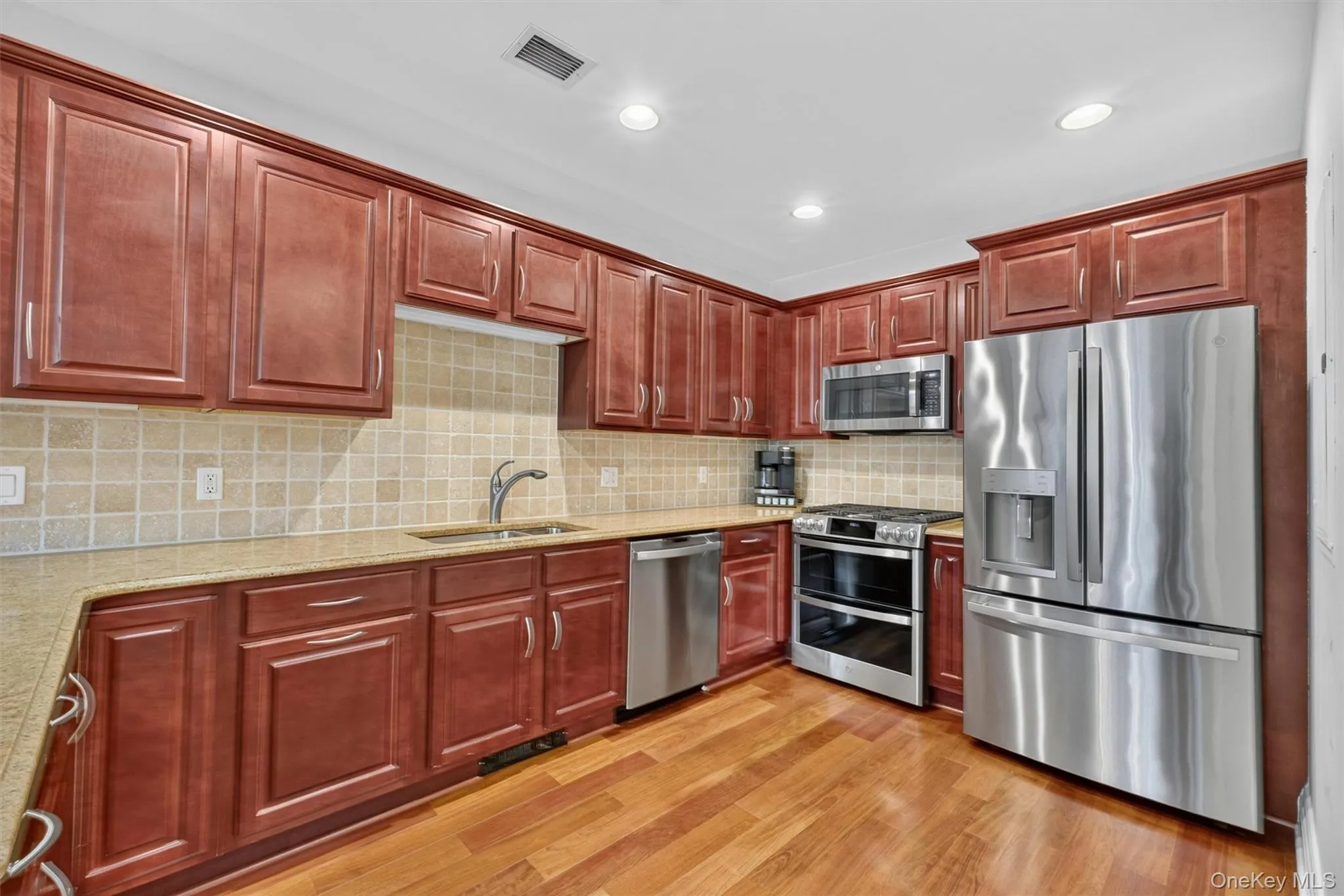 Spacious Kitchen with granite counters and stainless steel appliances. Spacious Kitchen with granite counters and stainless steel appliances.