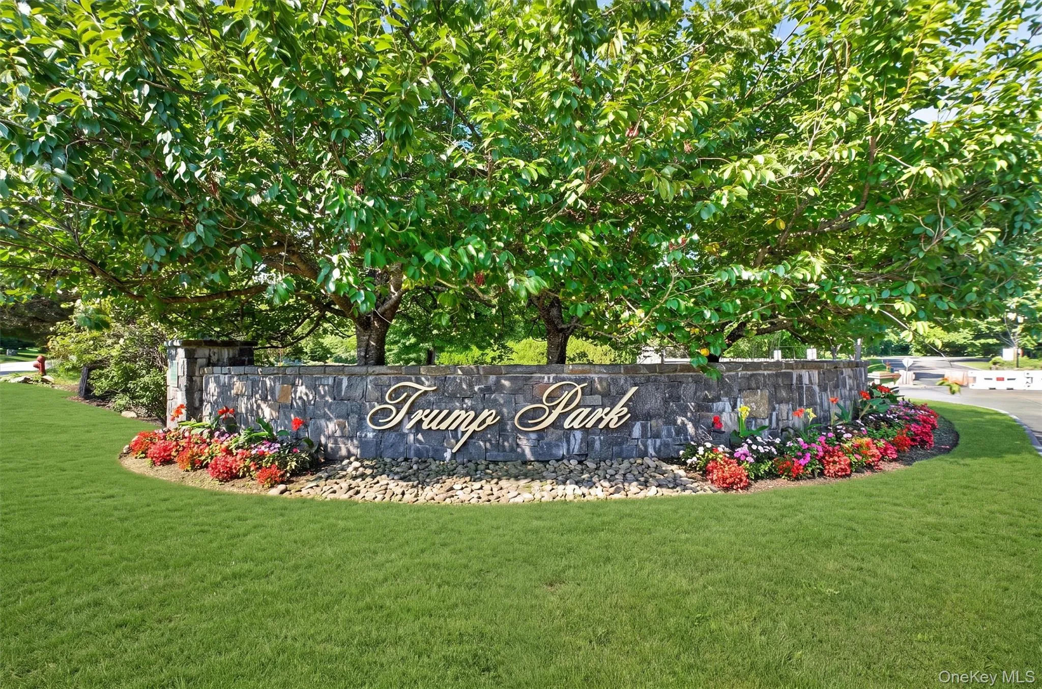 Beautifully manicured grounds accented by timeless stone walls and mature landscaping. Beautifully manicured grounds accented by timeless stone walls and mature landscaping.