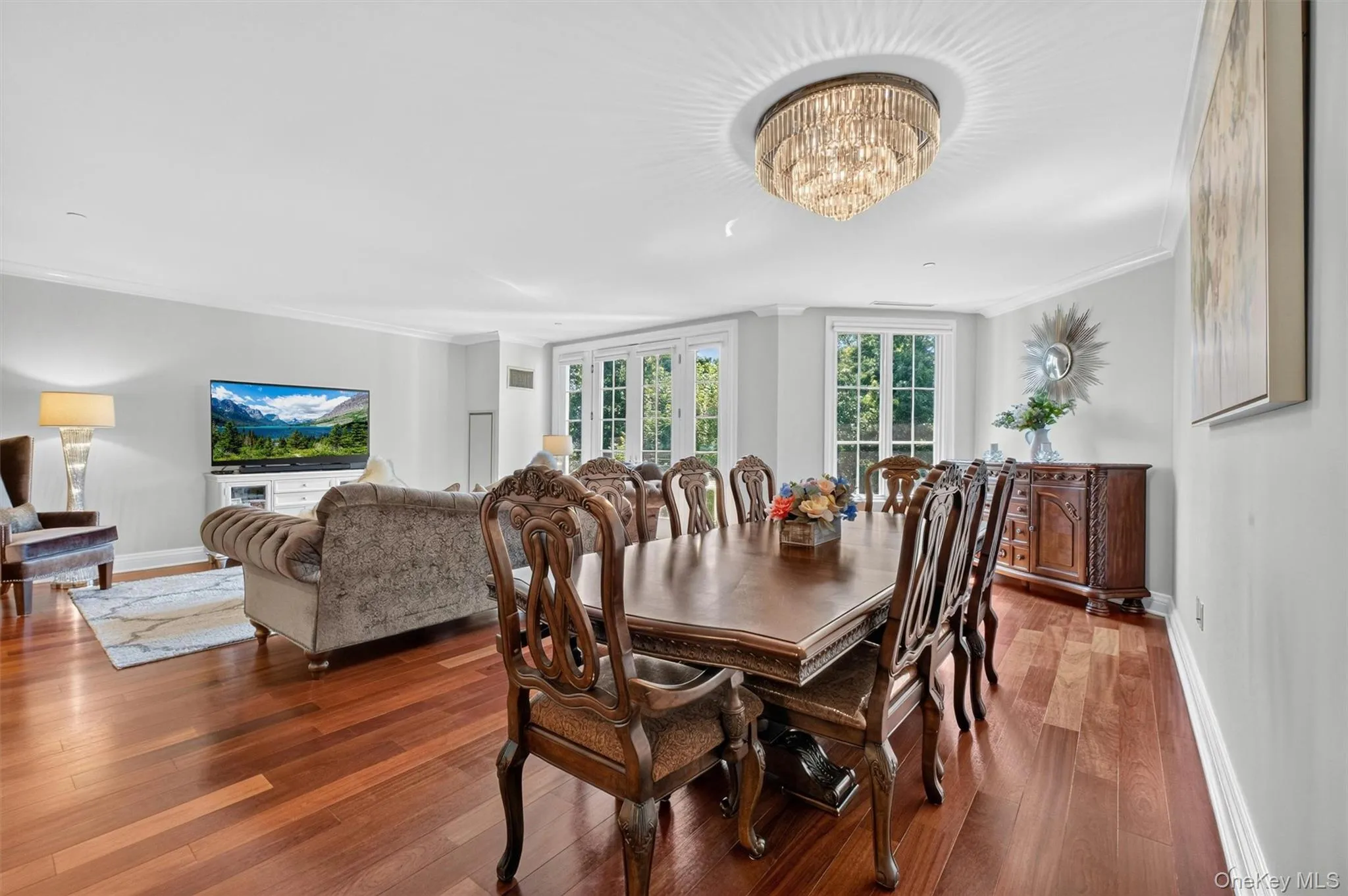 Formal Dining area highlighted by an elegant chandelier. Formal Dining area highlighted by an elegant chandelier.