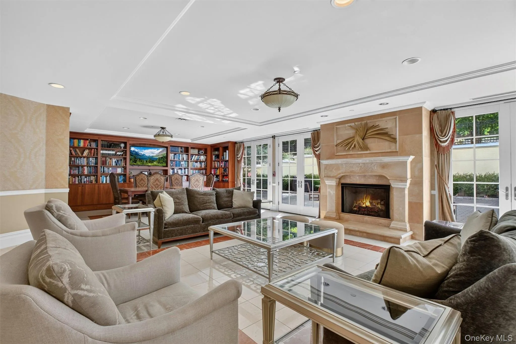 A distinguished library and spacious gathering room with fireplace create the perfect setting. A distinguished library and spacious gathering room with fireplace create the perfect setting.
