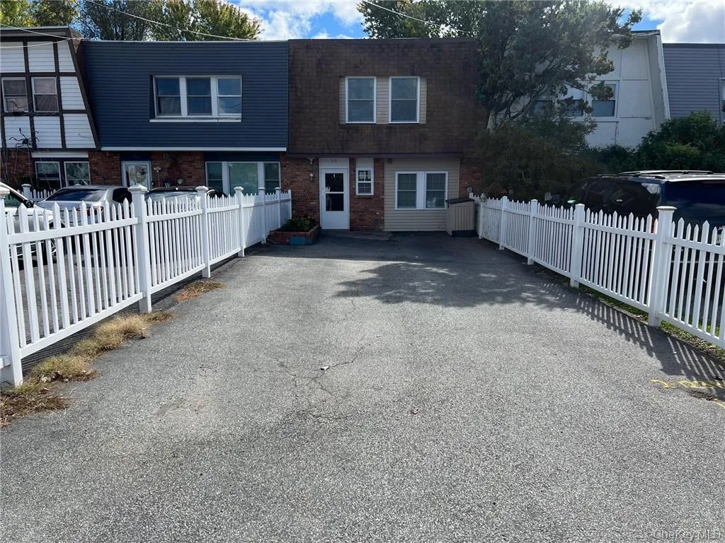View of front of house with a long driveway View of front of house with a long driveway
