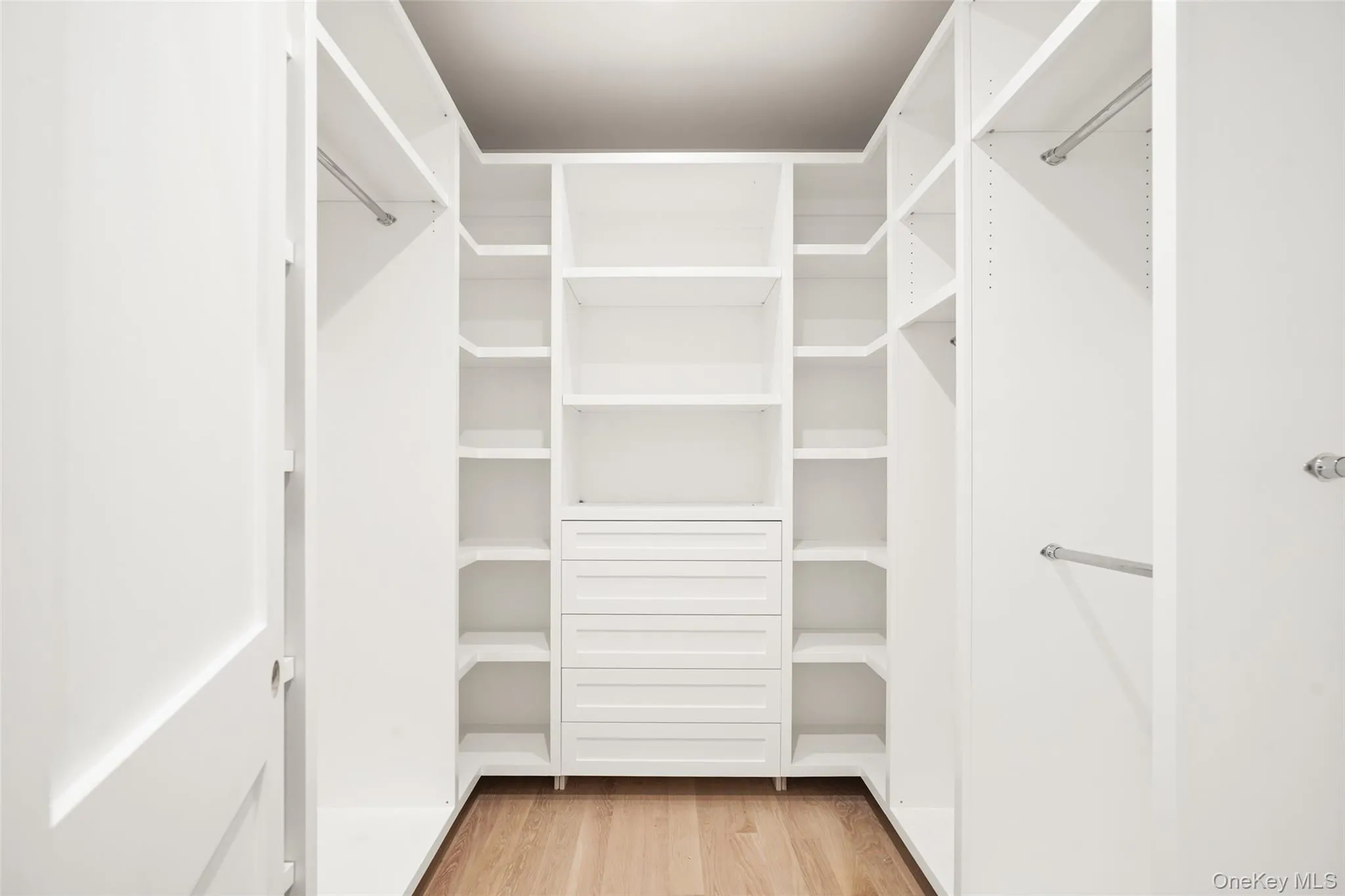 Primary closet (hers) Primary closet (hers)