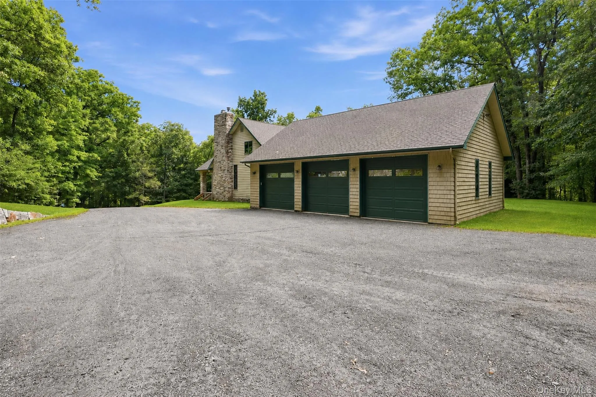 3 car plus space with storage loft above. Garage under the home can accommodate another 10-12 vehicles 3 car plus space with storage loft above. Garage under the home can accommodate another 10-12 vehicles